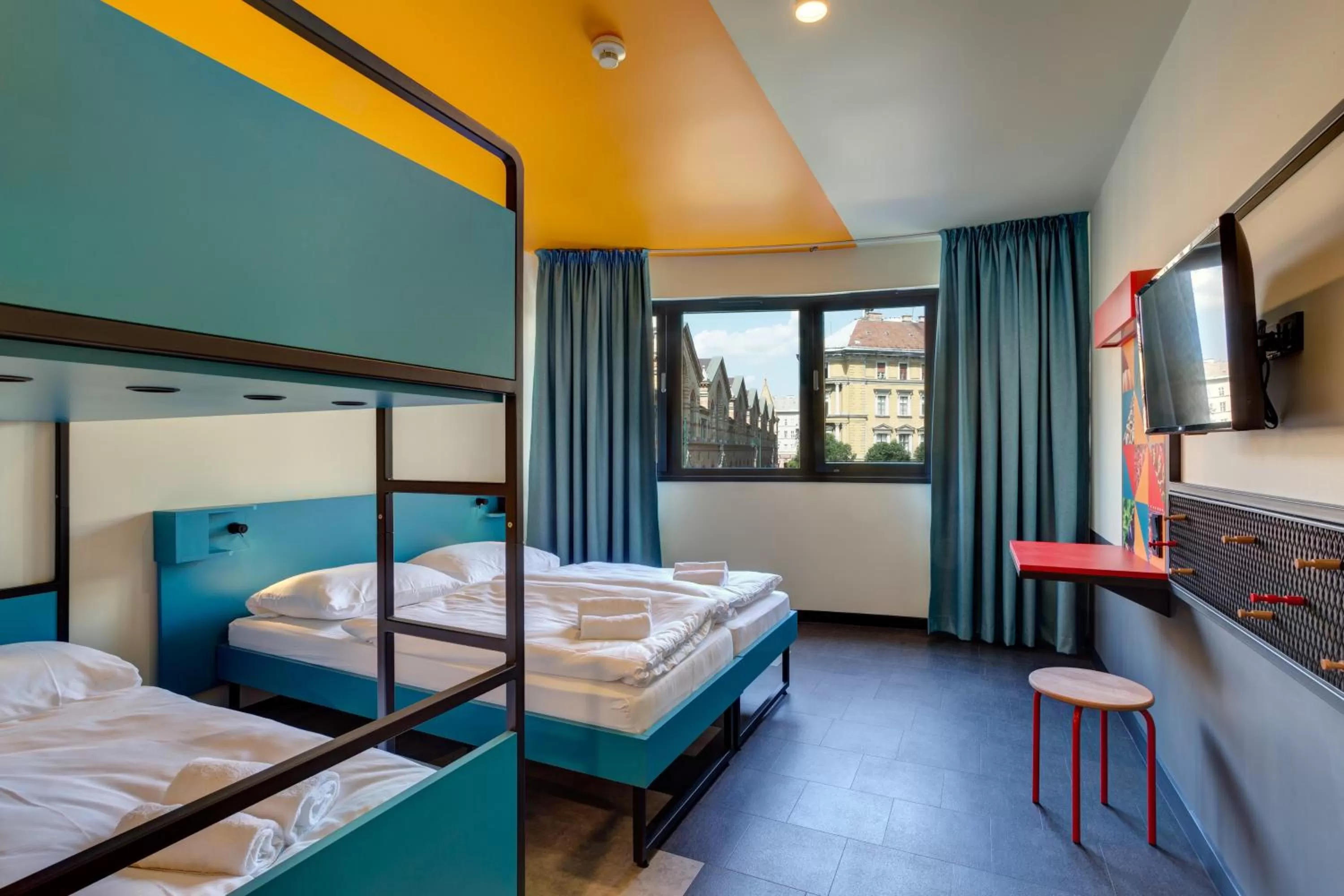 Photo of the whole room, Bed in MEININGER Budapest Great Market Hall