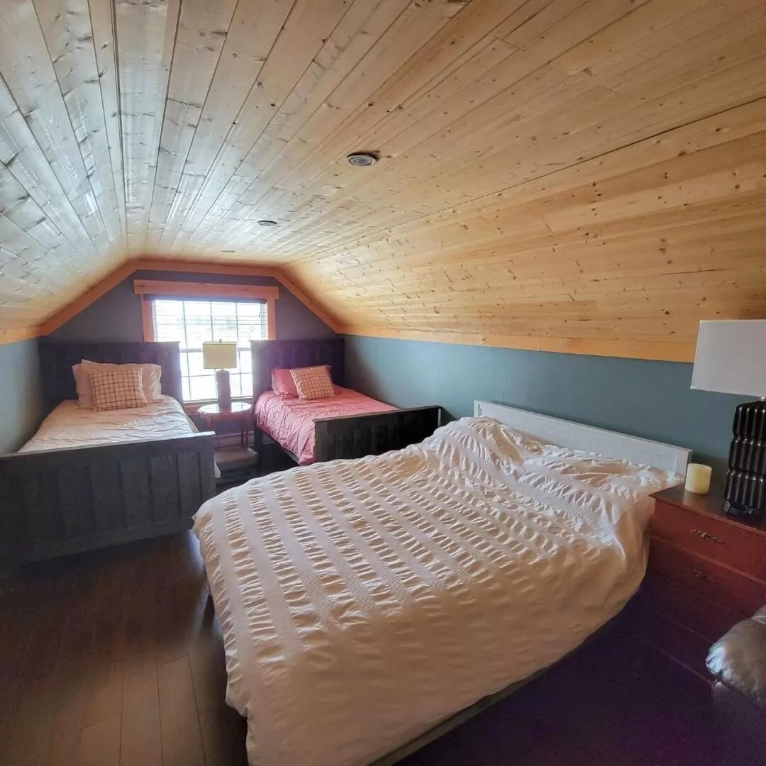Bed in The Deer Lake Loft