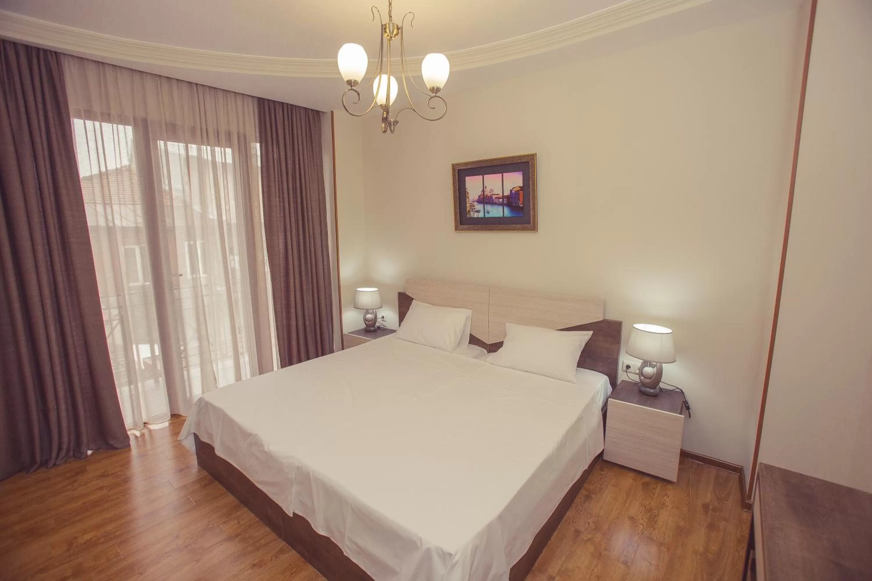 Bed in Royal Venezia Hotel