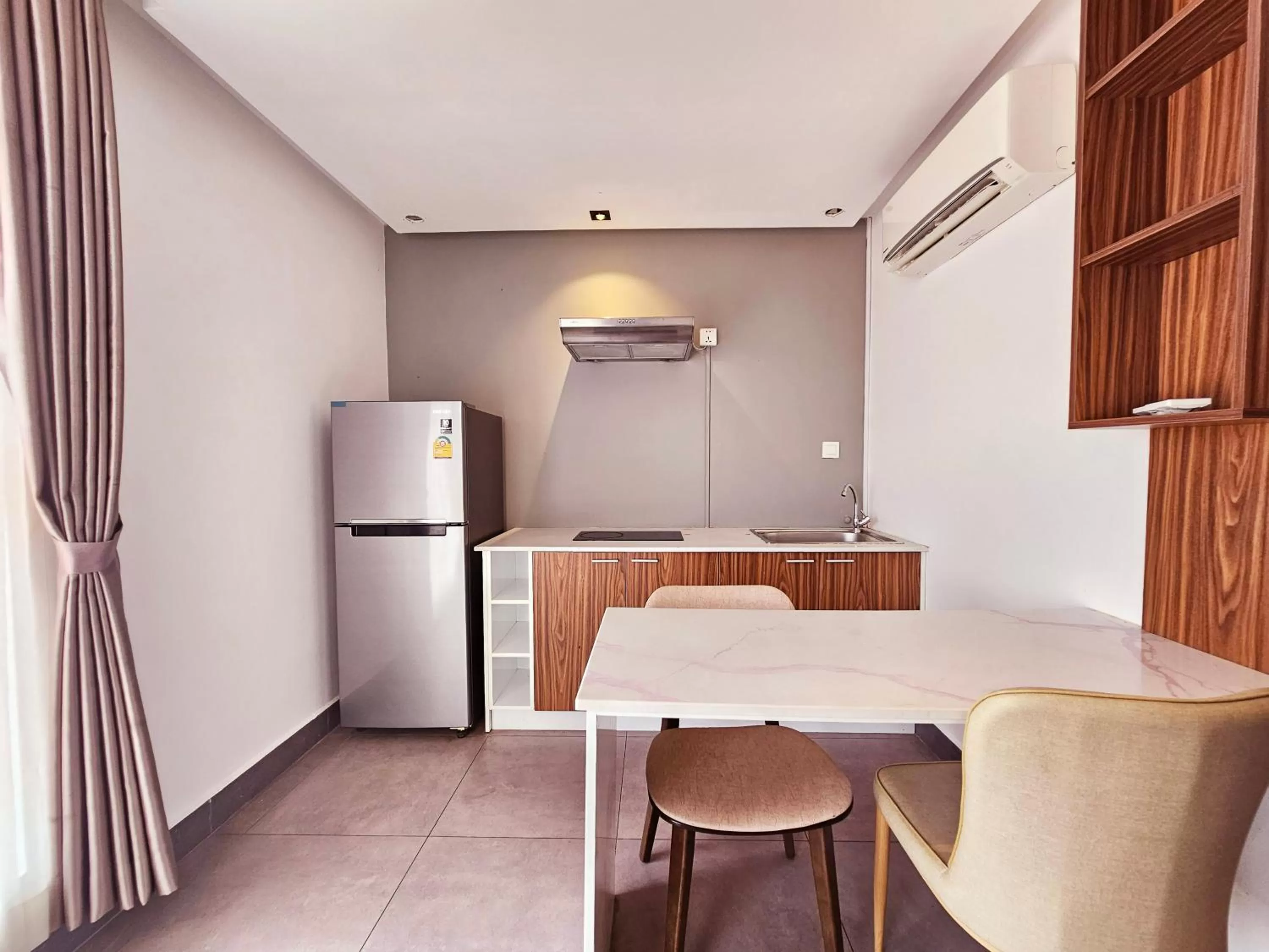 Kitchen or kitchenette in Le Botum Hotel