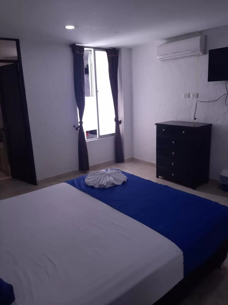 Bed in Blue Star Hotel