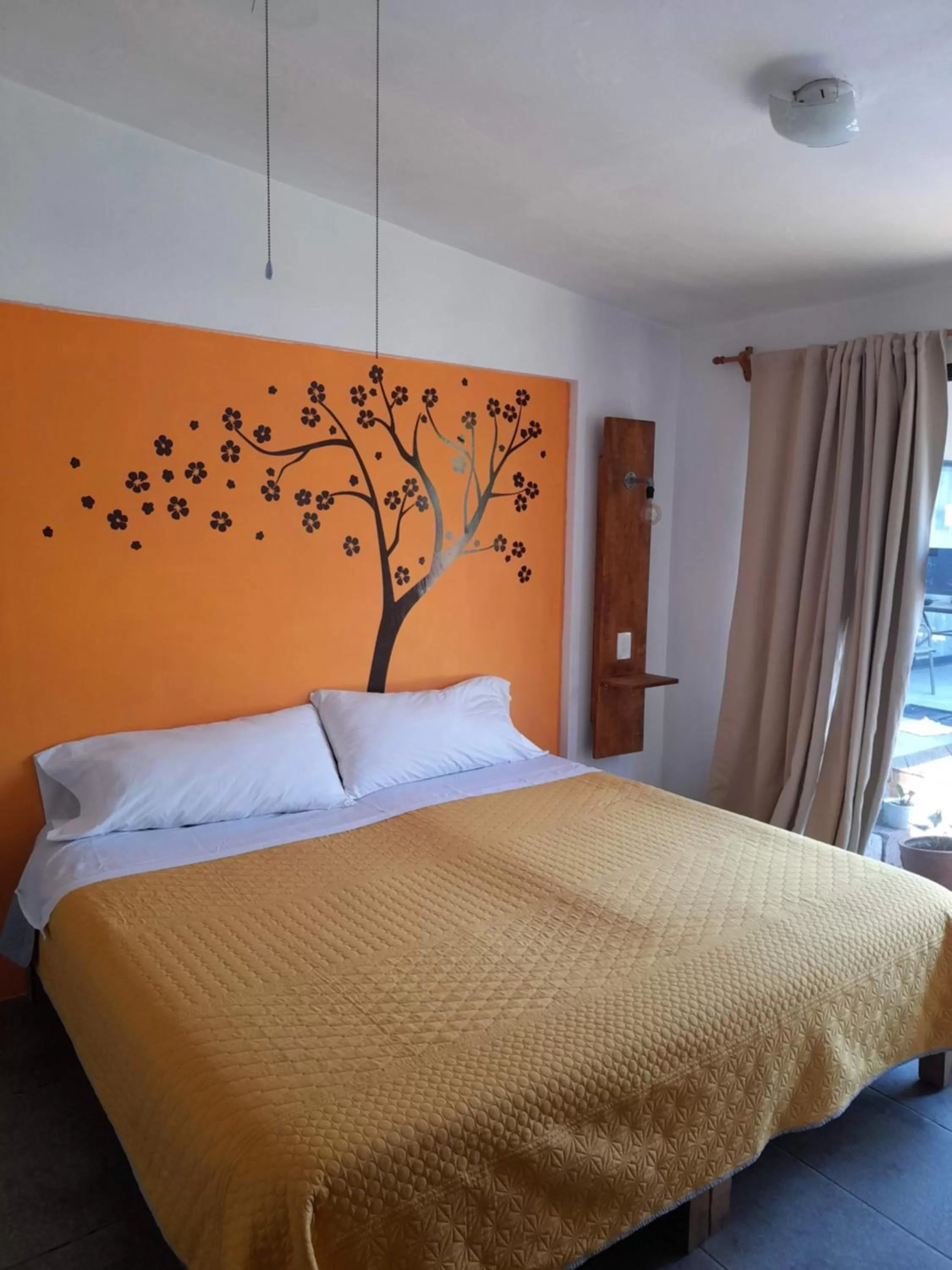 Bed in Posada Casa Topiltzin