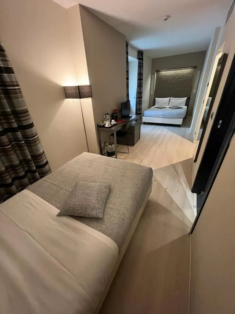 Bed in Hotel Diplomatic