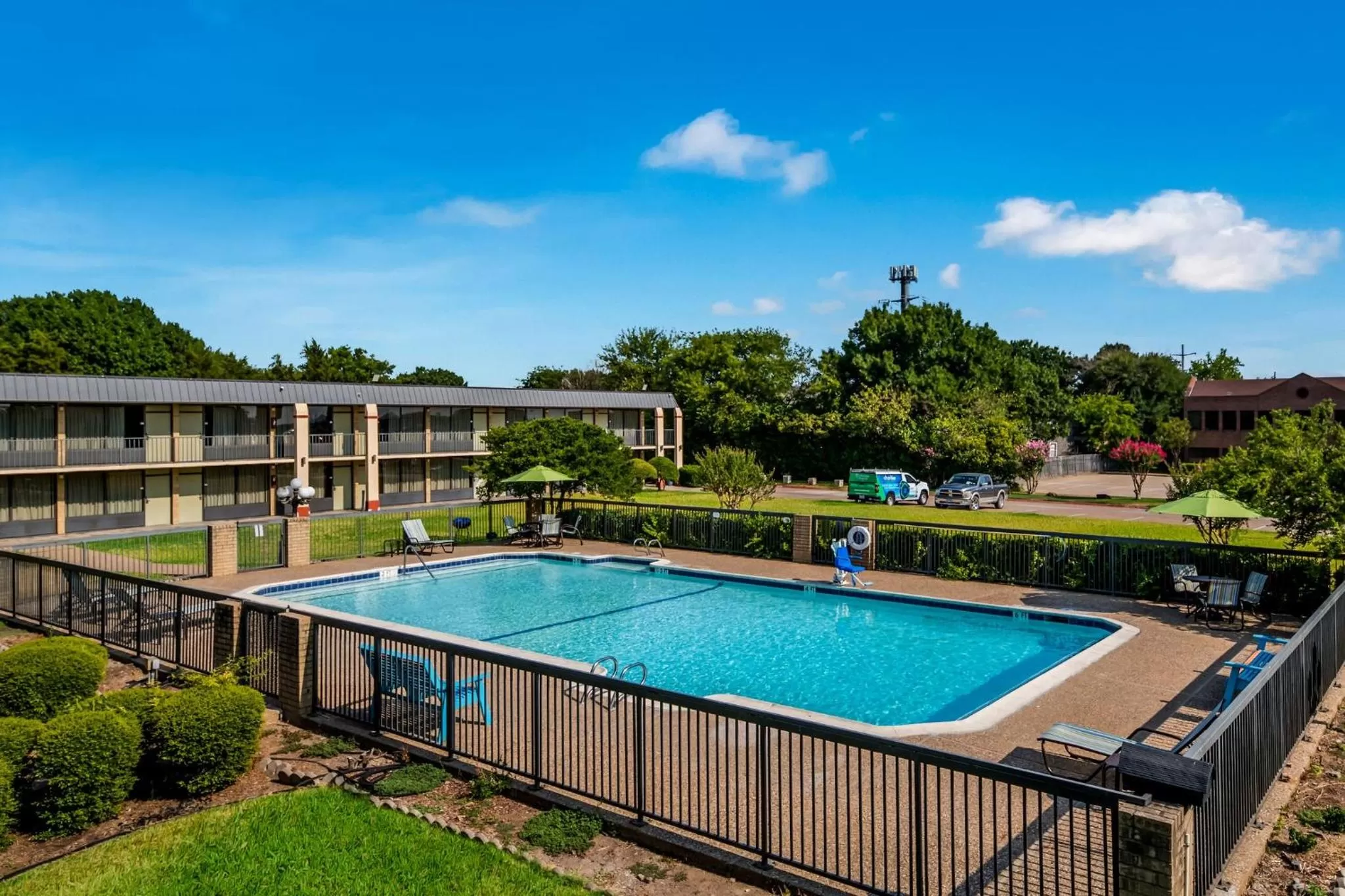 Swimming pool in Red Roof Inn & Conference Center McKinney