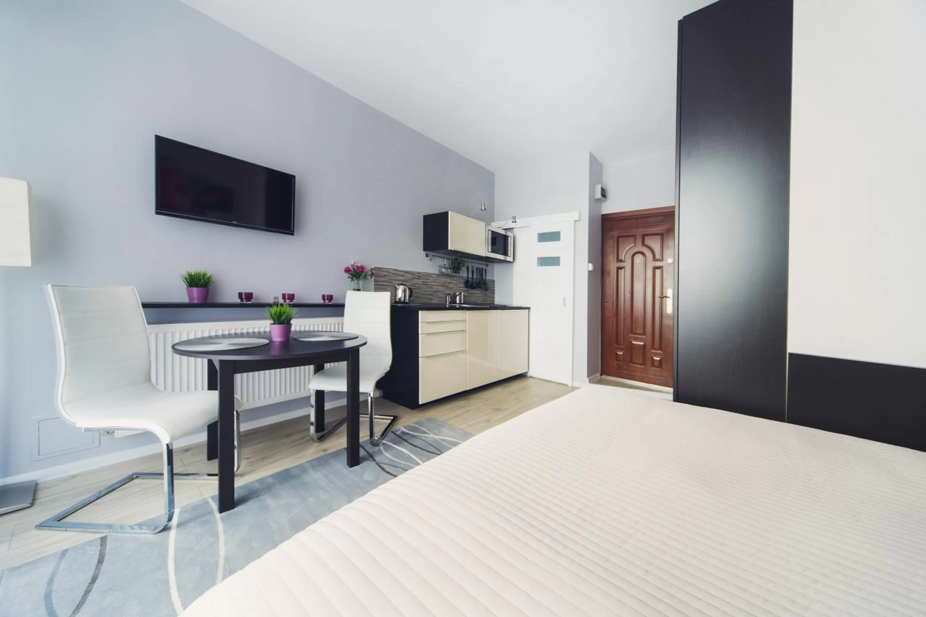 Kitchen or kitchenette, Bed in 4Seasons﻿ Apartments Cracow