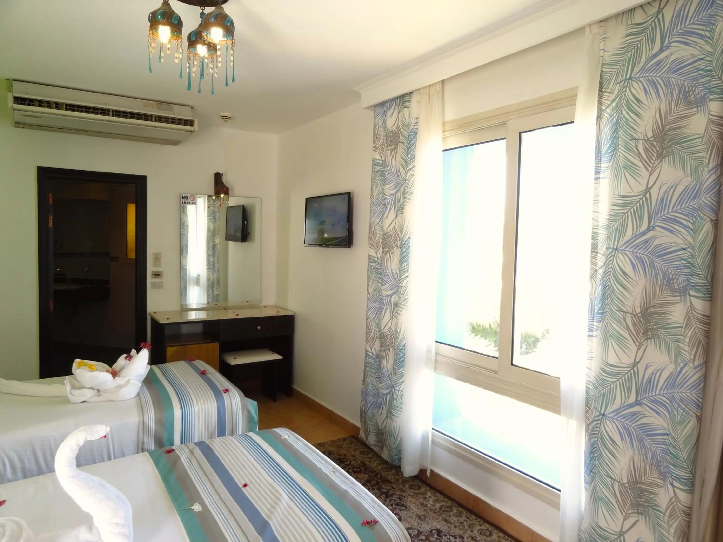 Photo of the whole room, Bed in Naama Blue Hotel