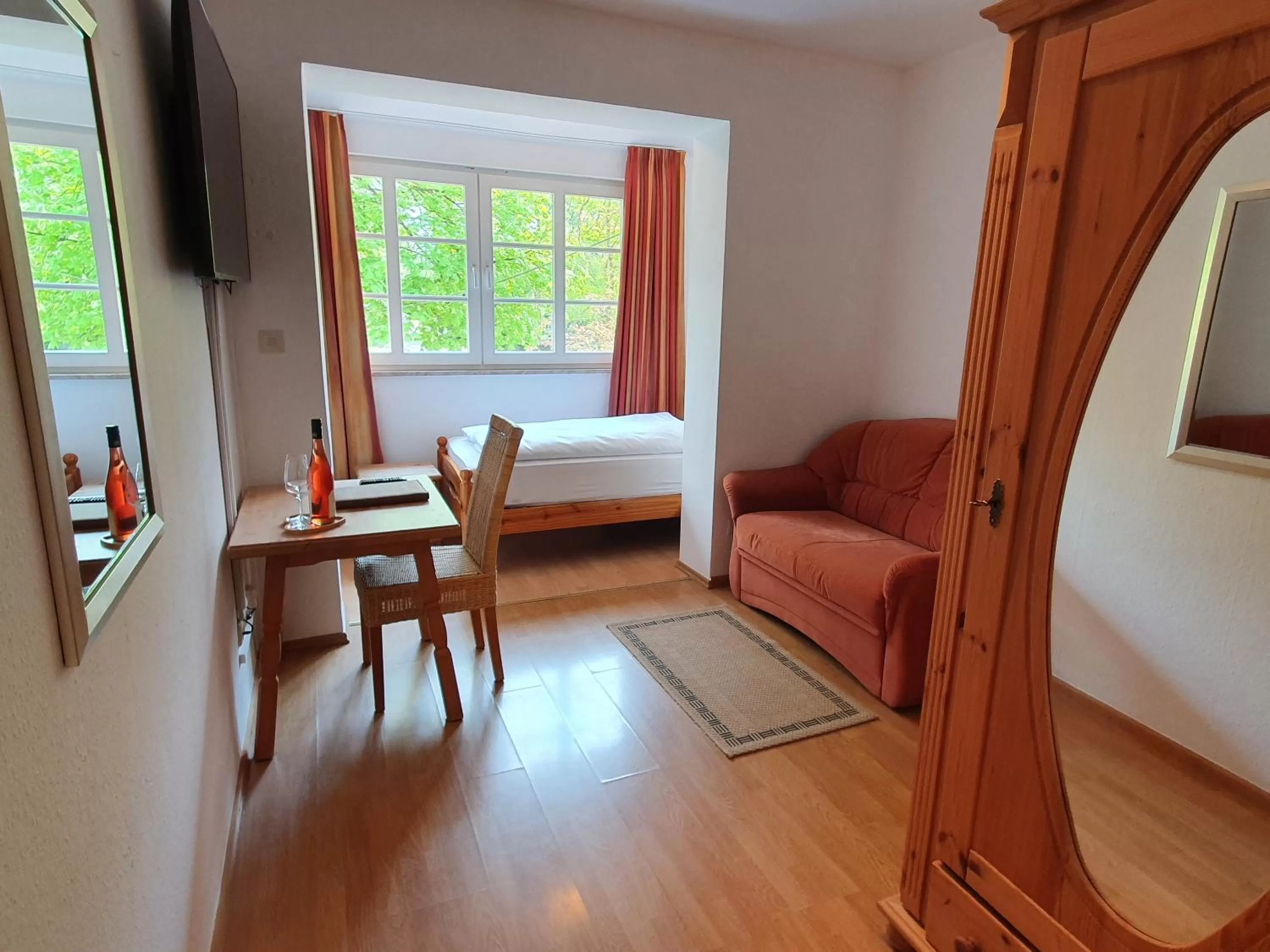 Photo of the whole room, Bed in Hotel und Weingut Karlsmühle