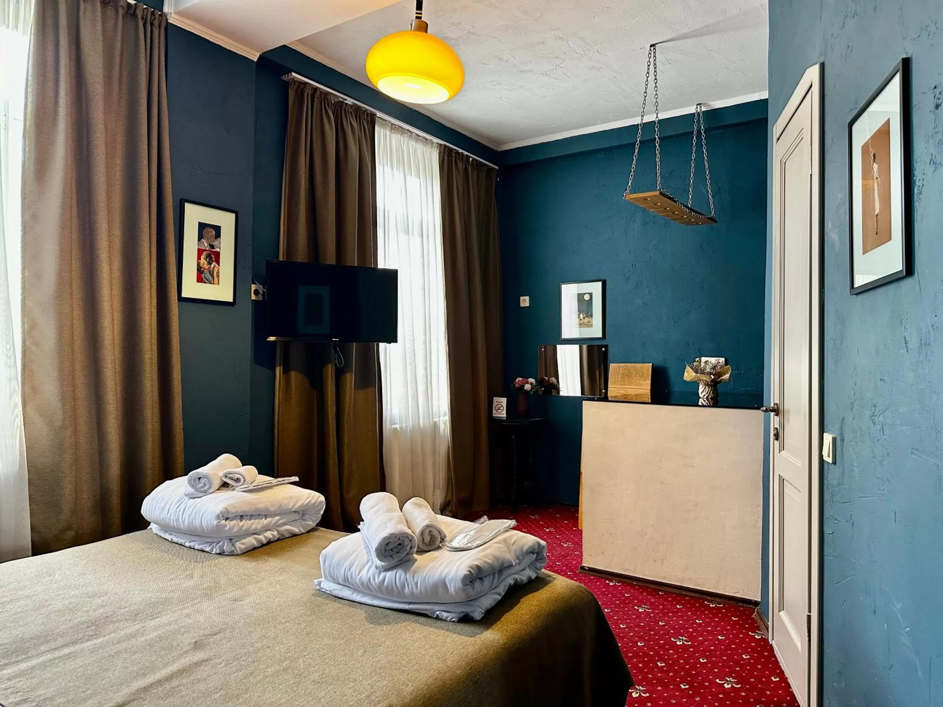 Bed in Kindli Boutique Hotel