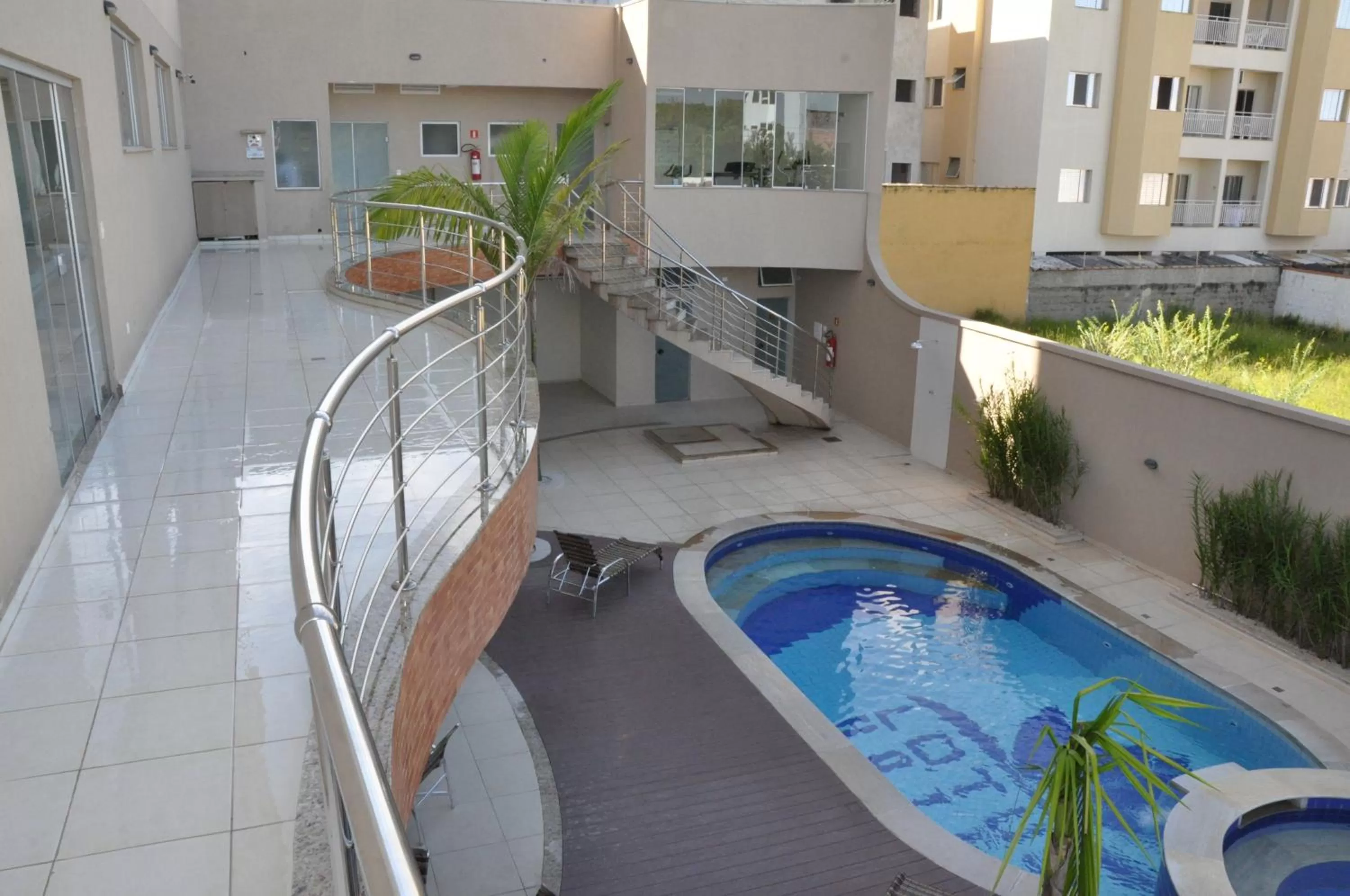 Swimming pool in Lotus Hotel - à 6 km do Santuário de Aparecida-SP