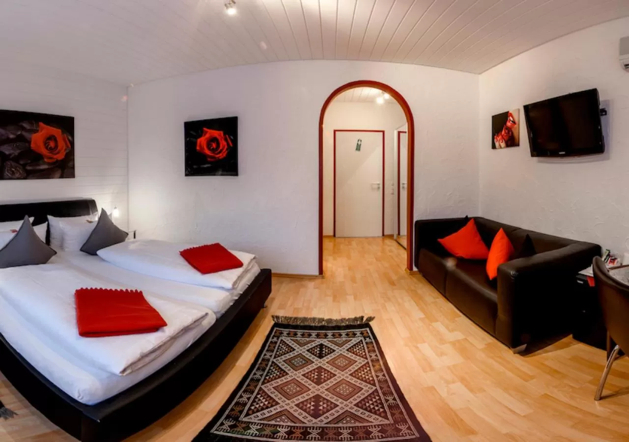 Seating area, Bed in Hotel Rosenhof GmbH