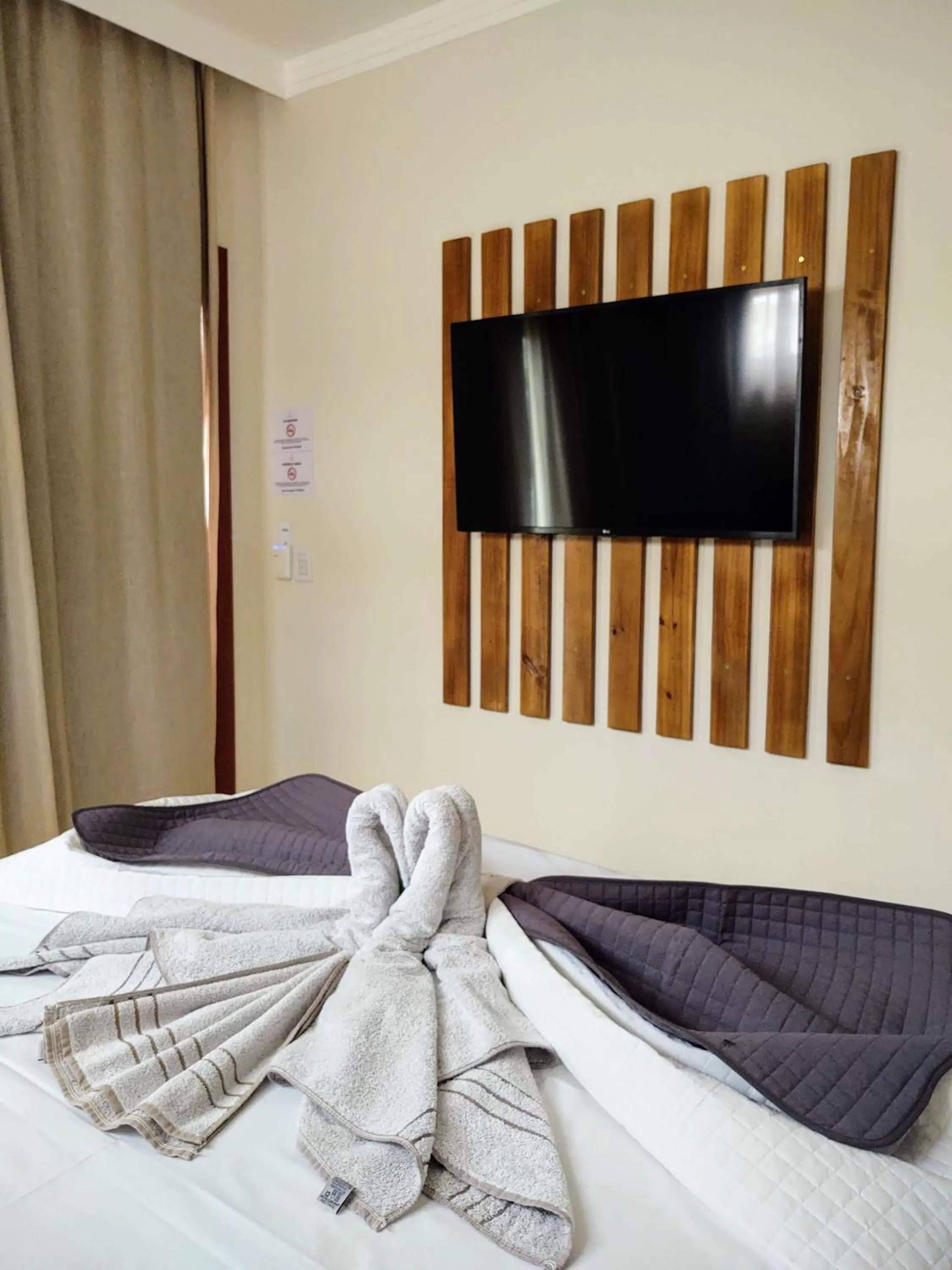 Bed in Kai'ala Pousada