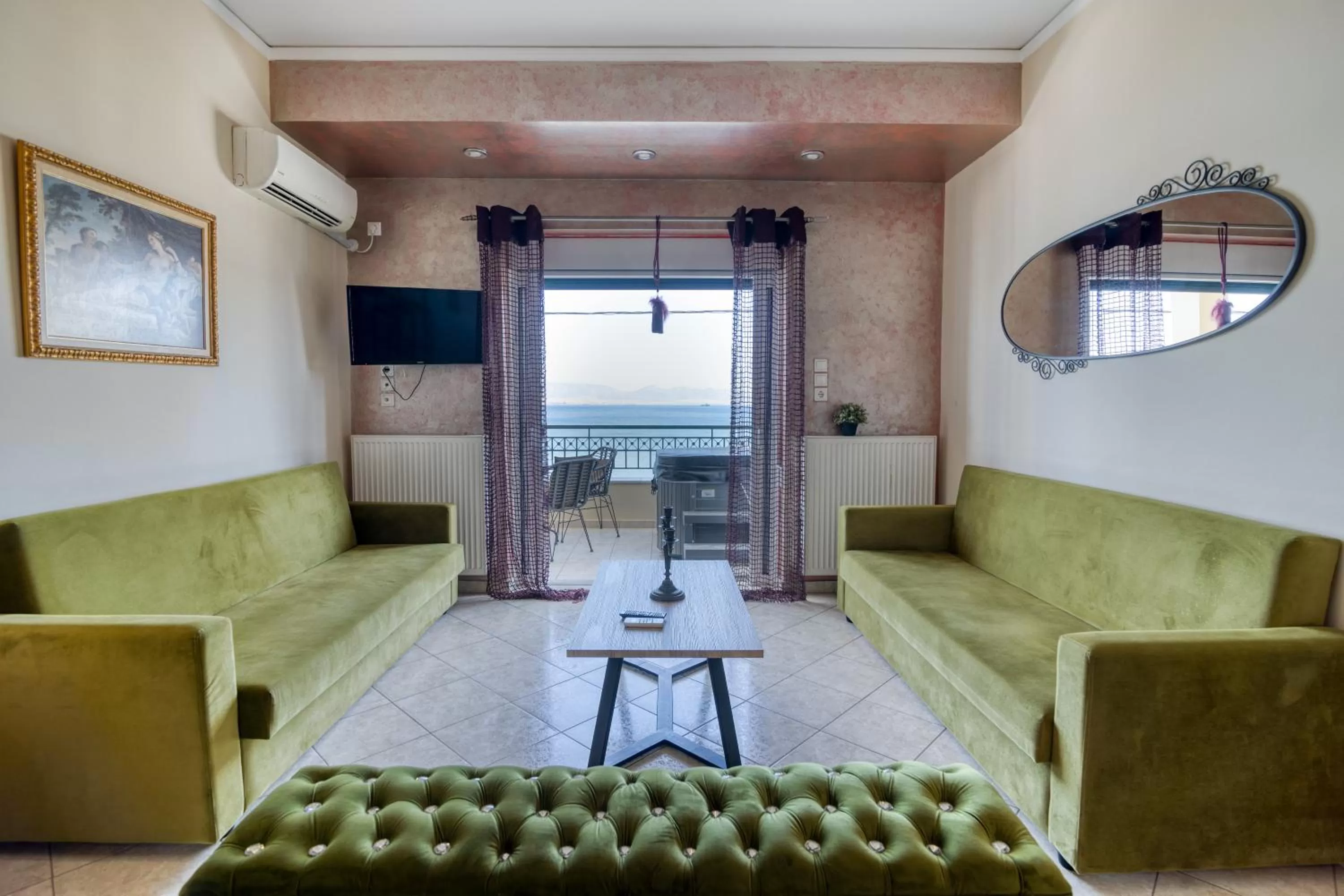 Communal lounge/ TV room in Votsalakia Hotel & Luxury Apartments