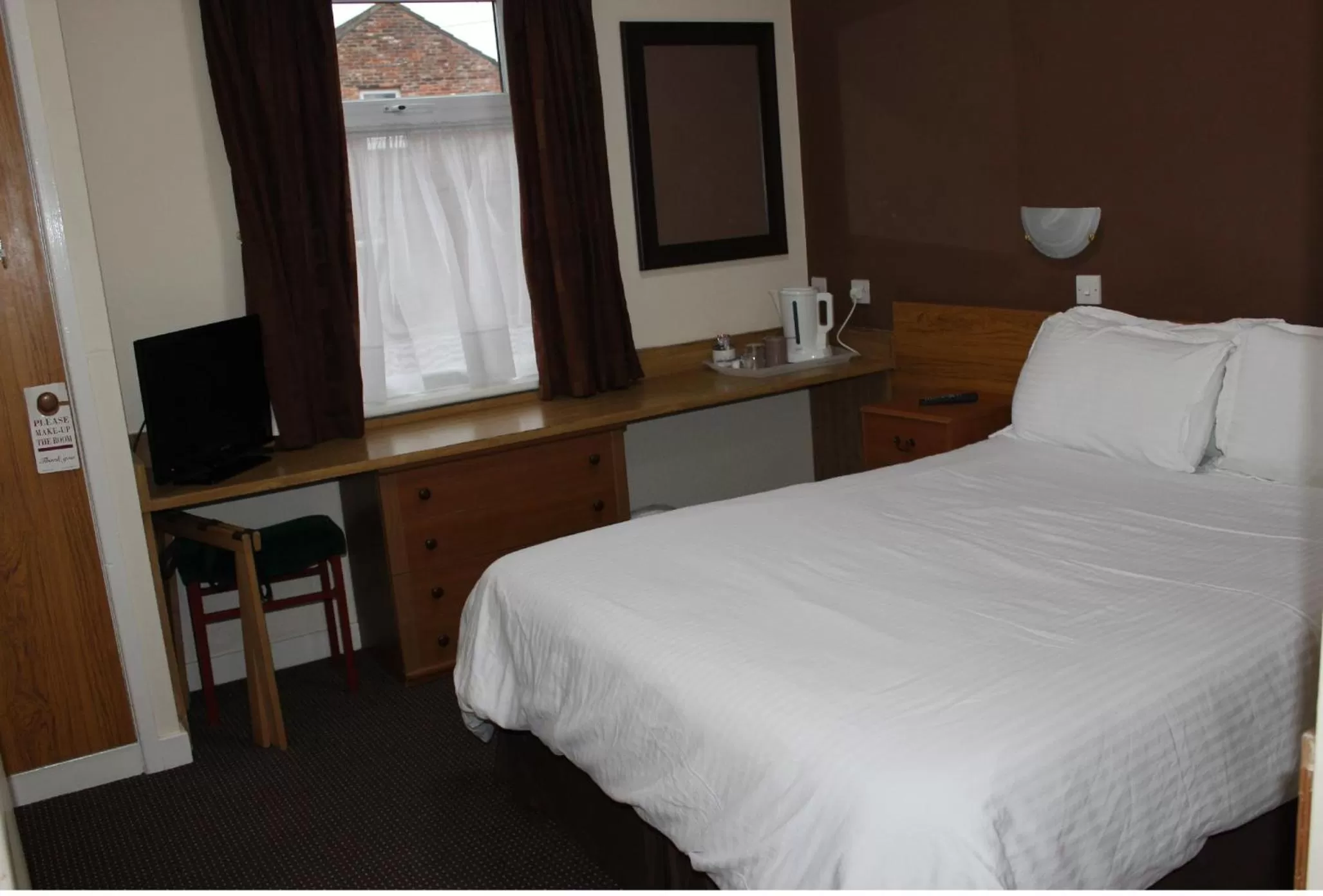 Bed in The Premier Lodge