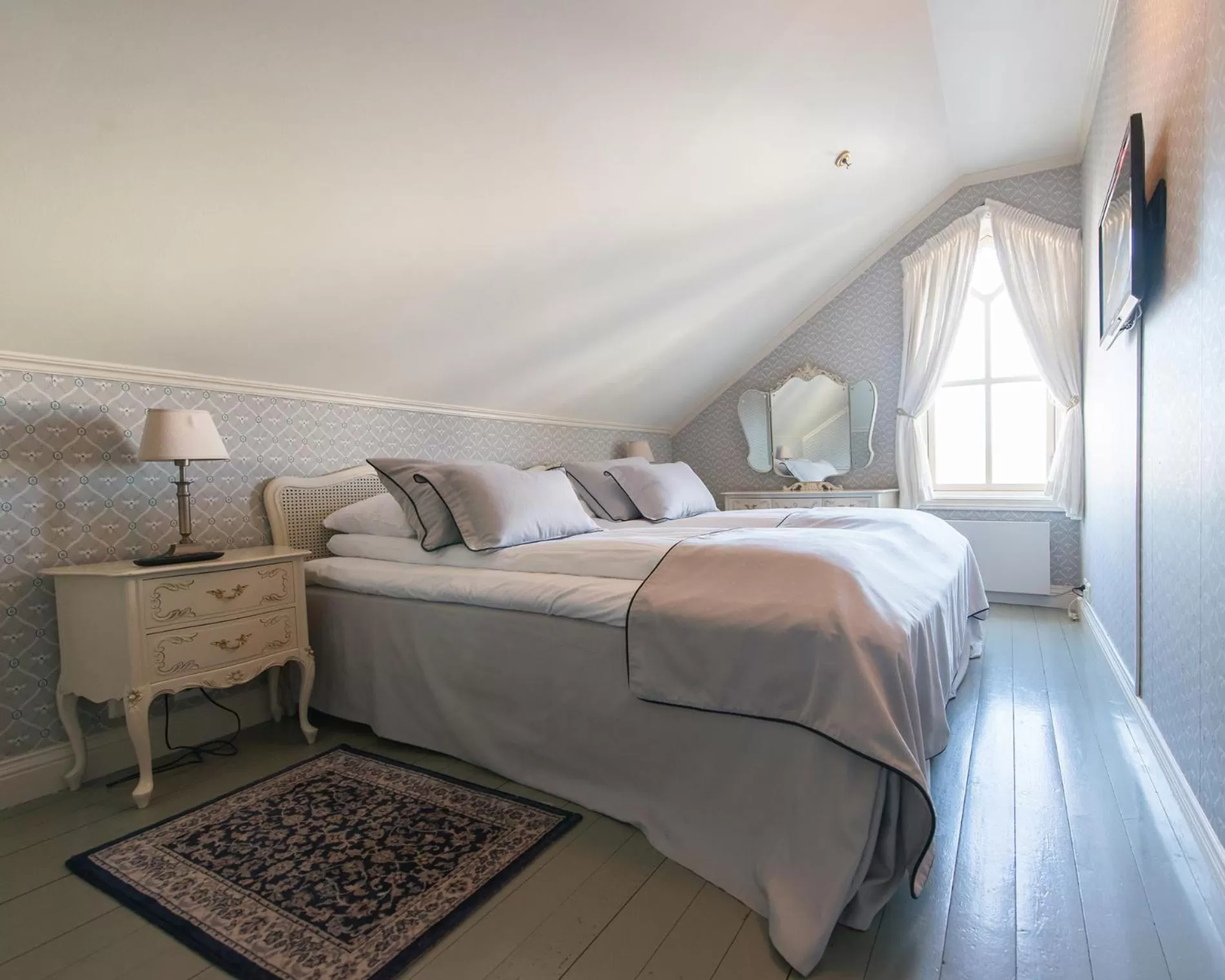 Bed in Lillesand Hotel Norge