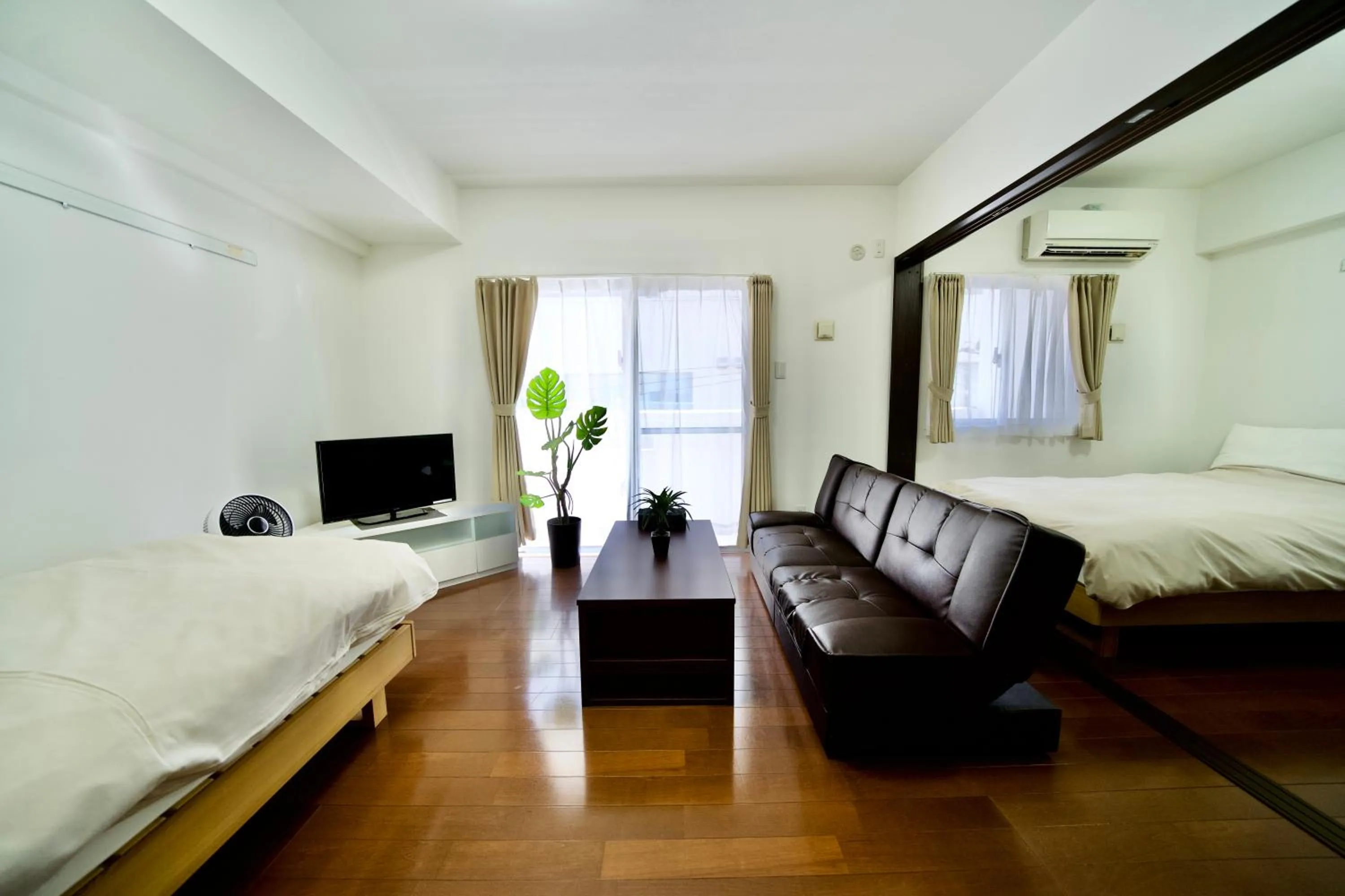 Seating area, Bed in Villa Izumizaki