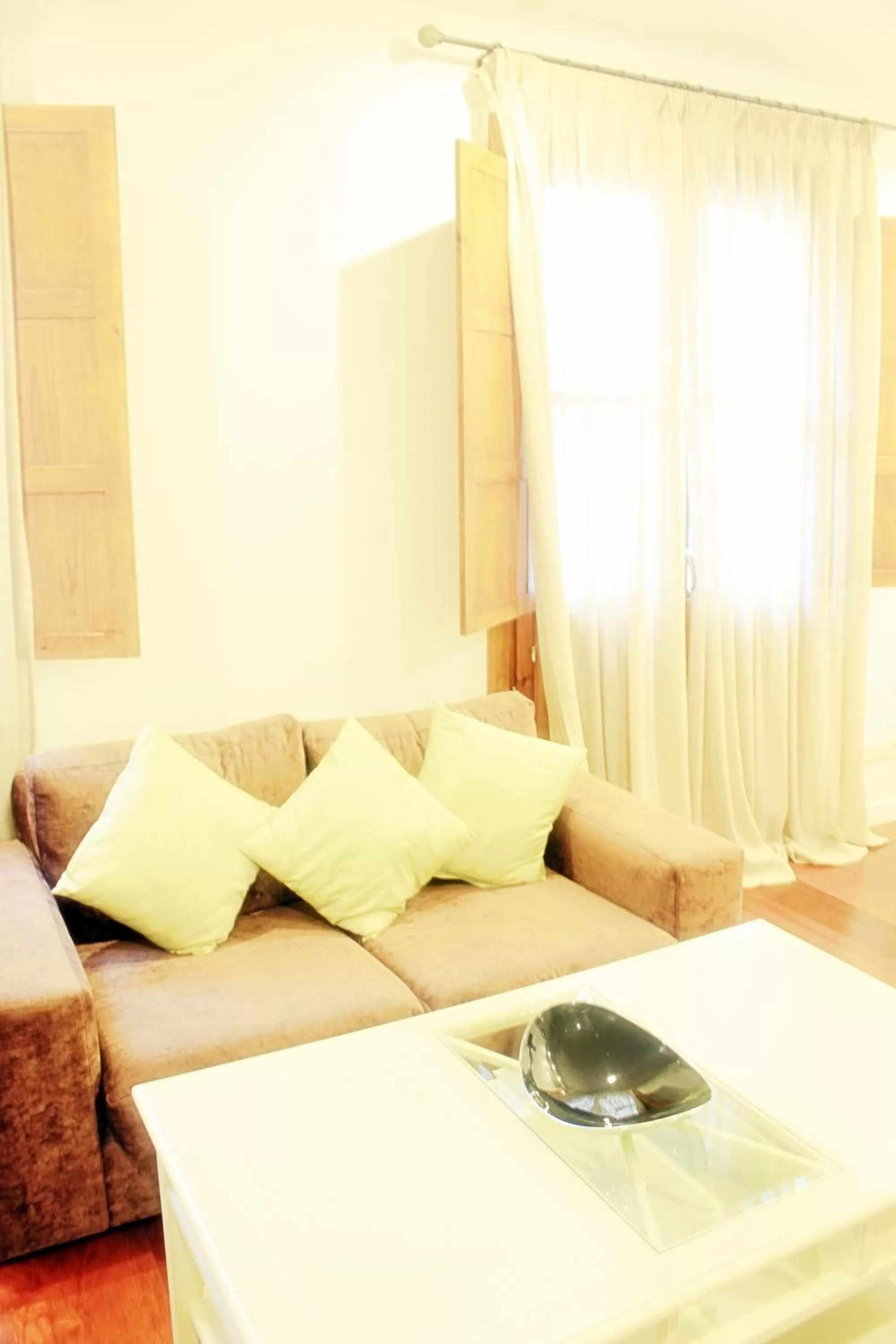 Living room, Bed in Casa Urbana Suites