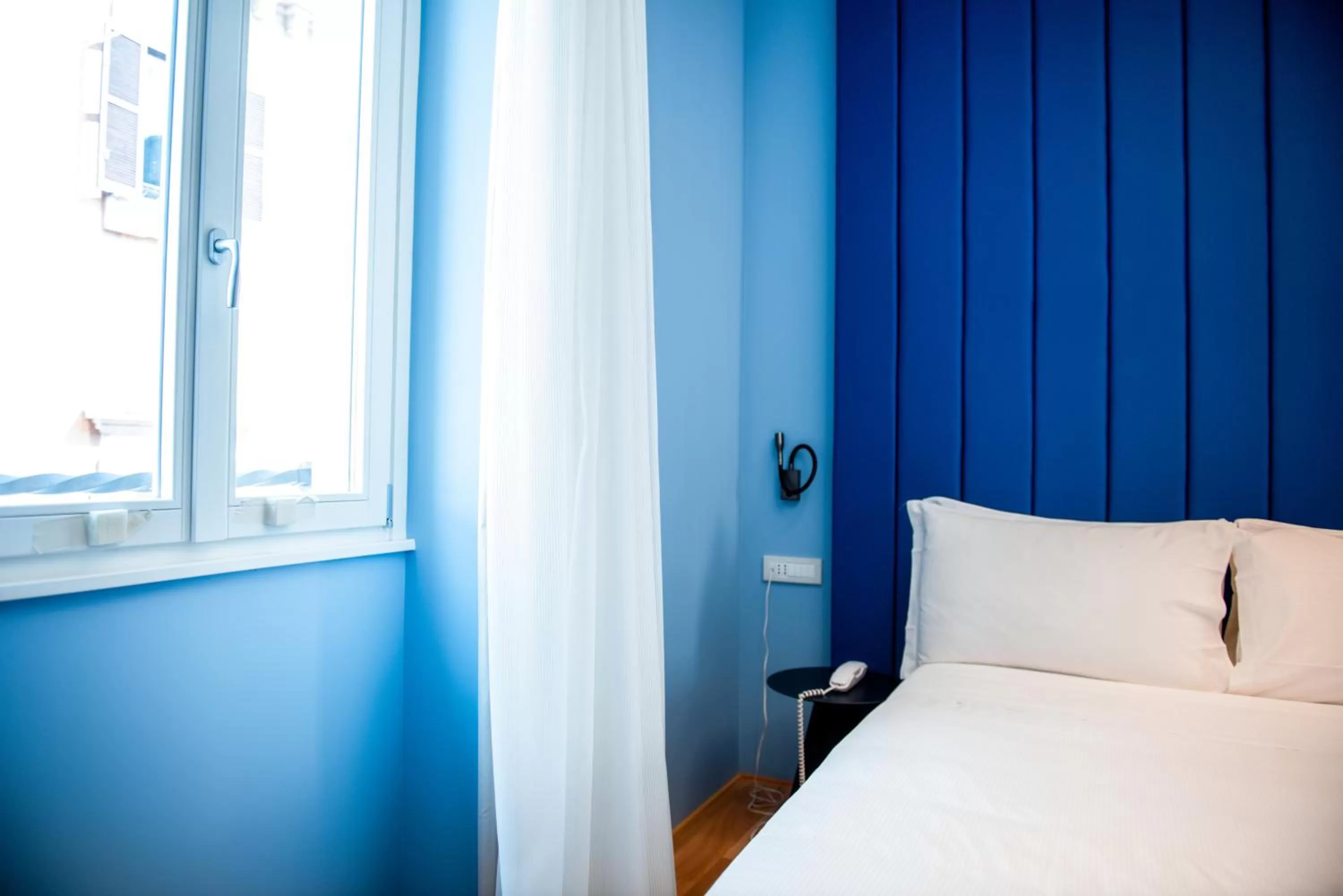Decorative detail, Bed in Boutique Centrale Palace Hotel