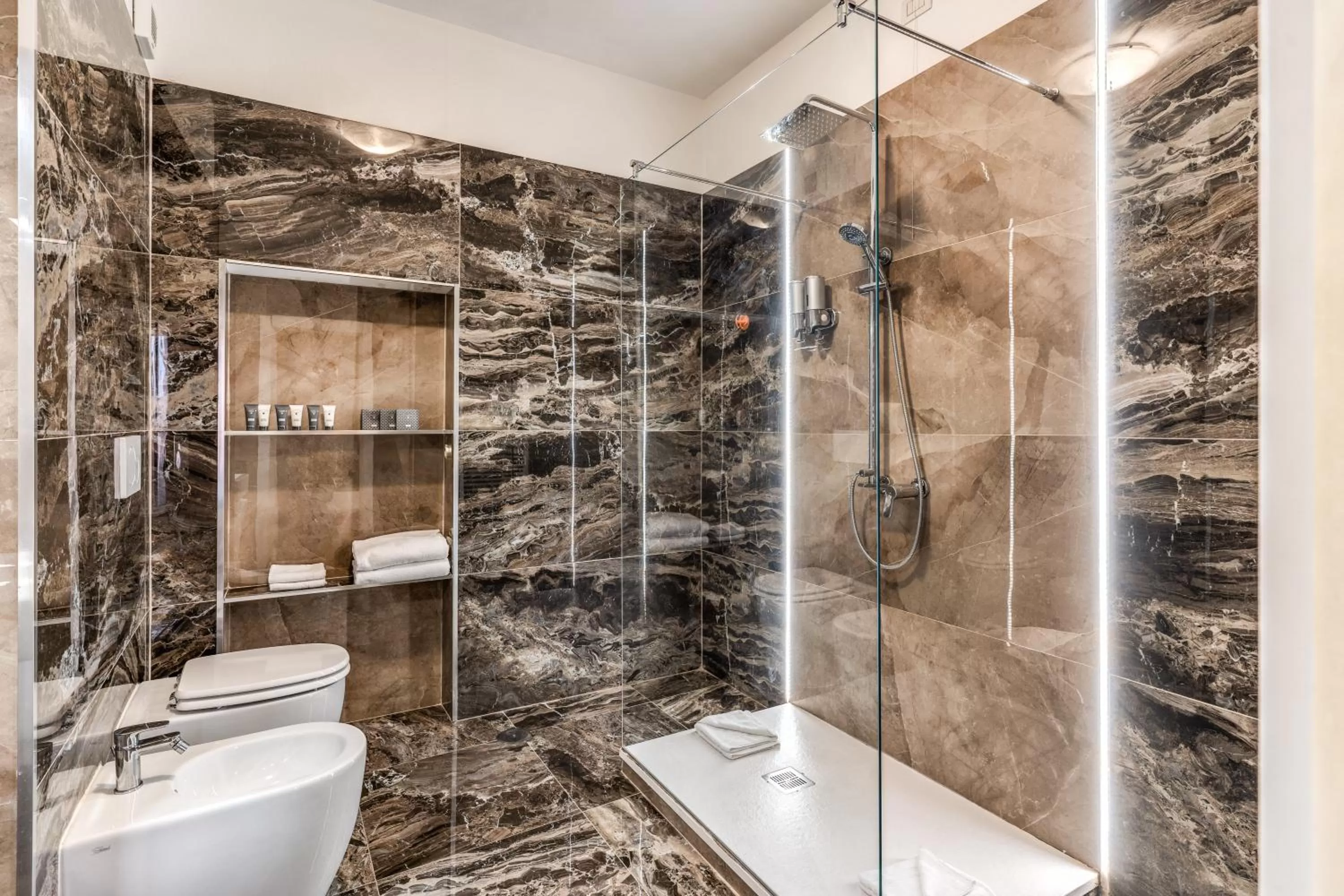 Bathroom in Relais Fontana Di Trevi Hotel