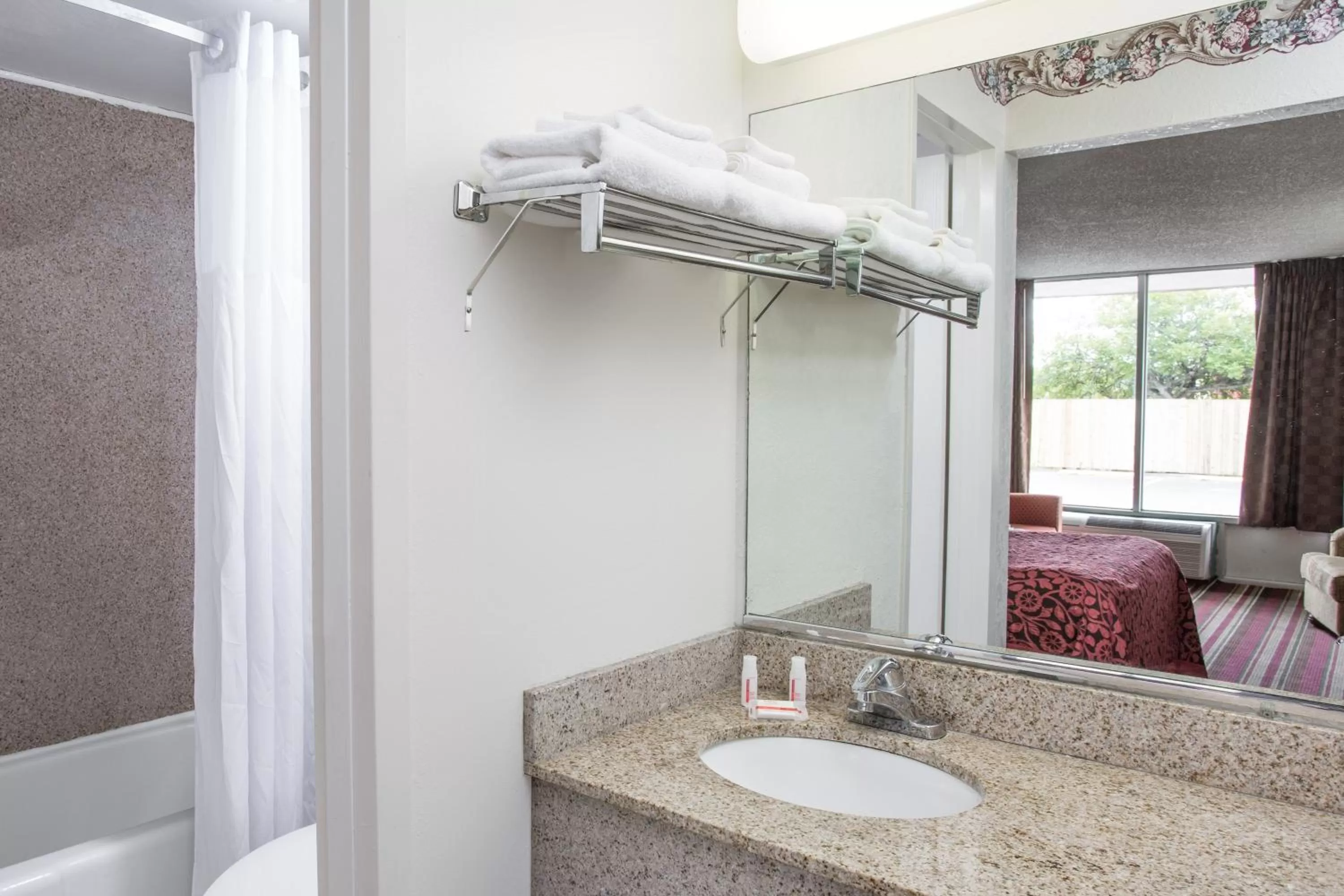 Bathroom, Bed in Days Inn by Wyndham Fort Myers