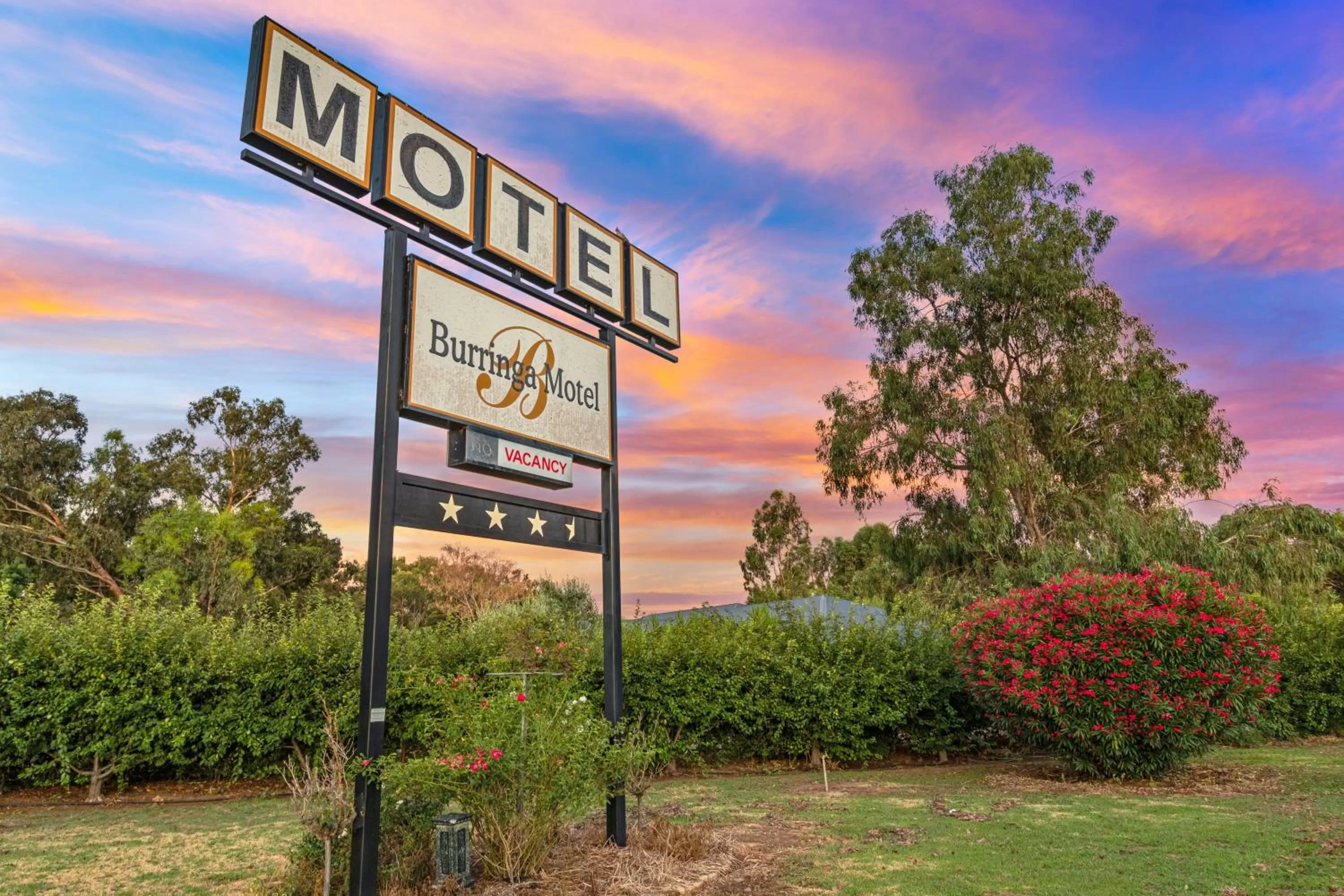 Property logo or sign in Burringa Garden Motel