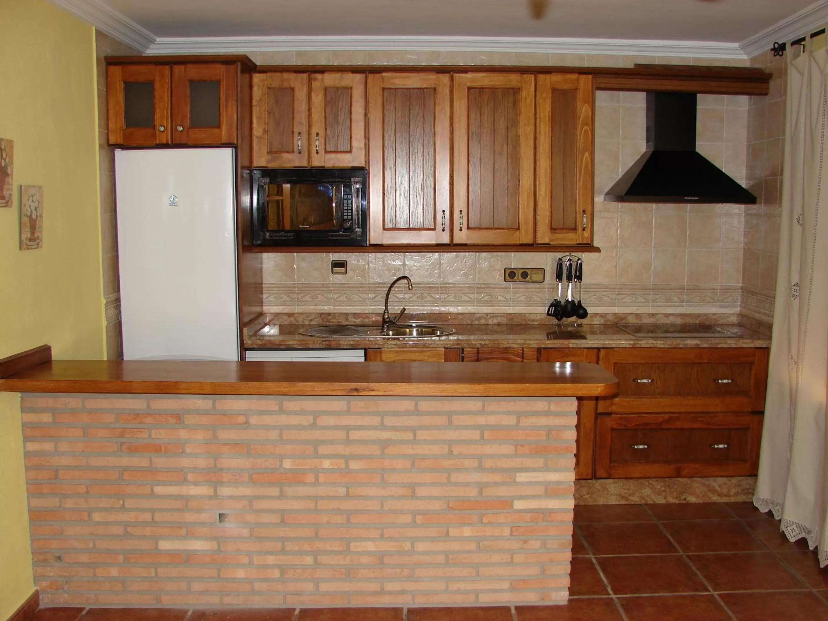 Kitchen or kitchenette in Apartamentos Sierra de Segura