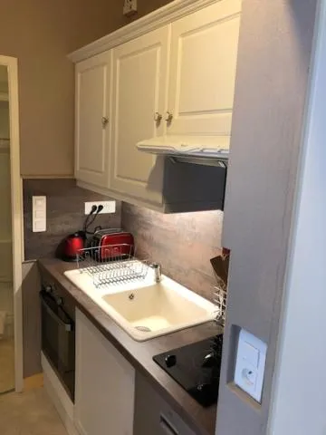 stove in Hôtel Beau Rivage