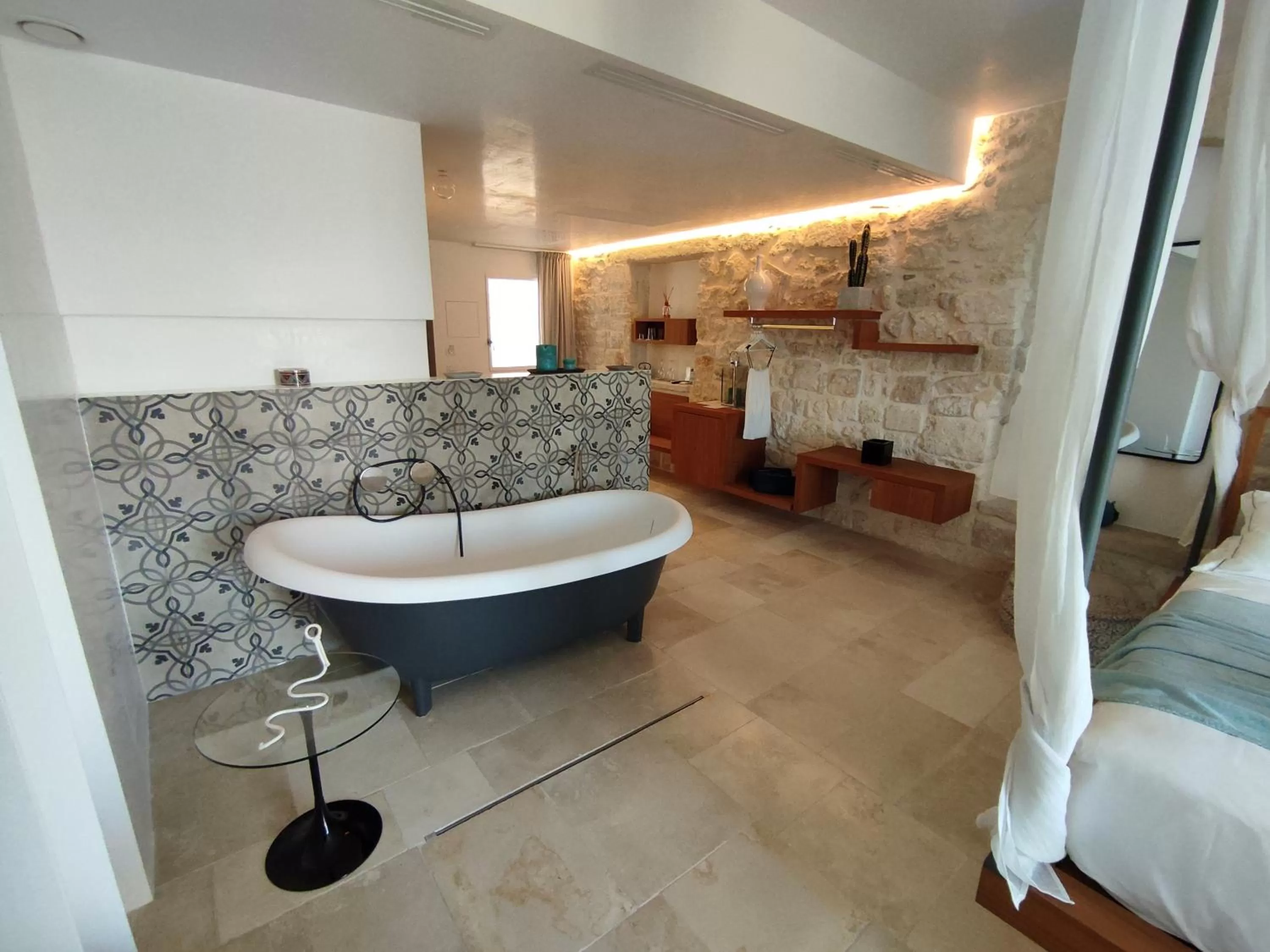 Bed in Antico Mondo Rooms & Suites