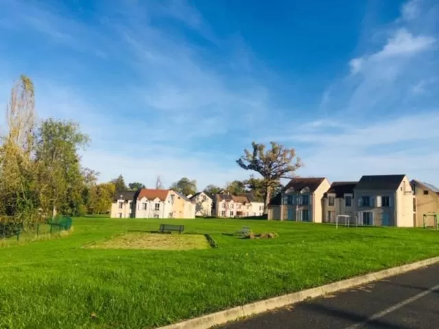 Garden view, Property Building in Appart Hôtel 3* dans une résidence de tourisme