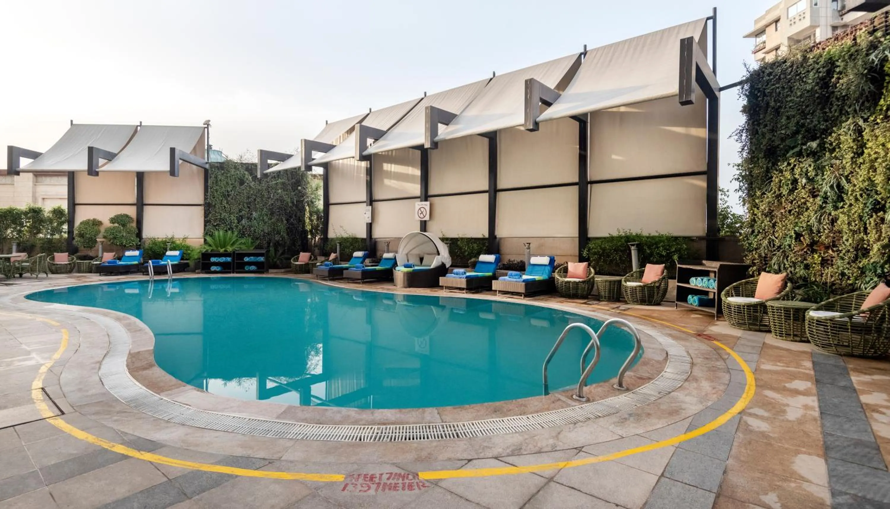 Swimming pool in Radisson Gurugram Sohna Road City Center