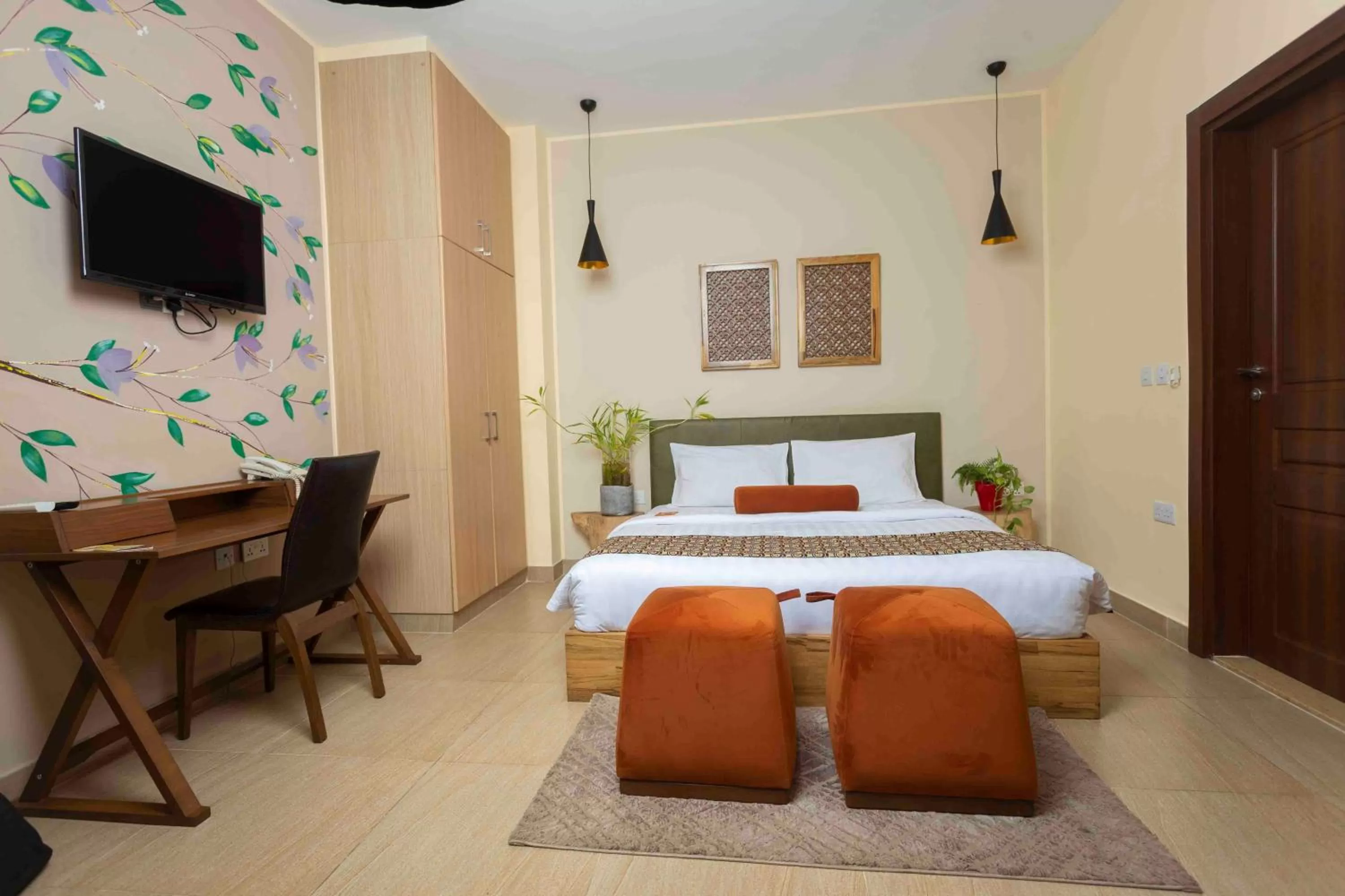 Bed in Roots Hotel Apartment