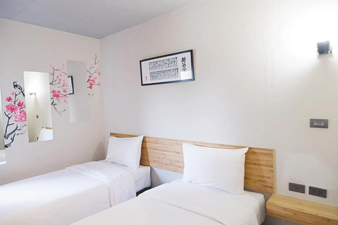 Photo of the whole room, Bed in Izen Plus Budget Hotel & Residence