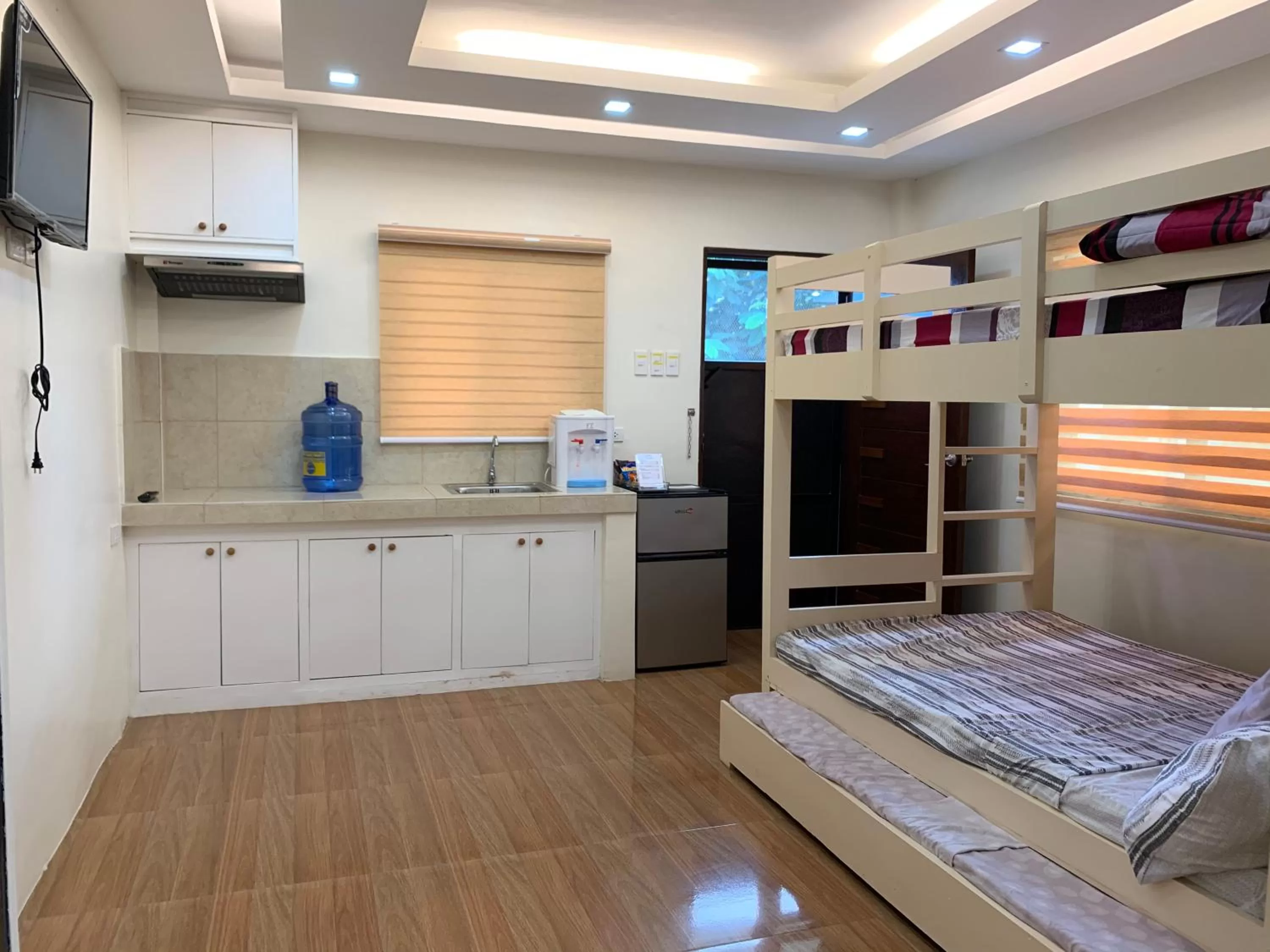 Bed in Rustic Crown Hotel