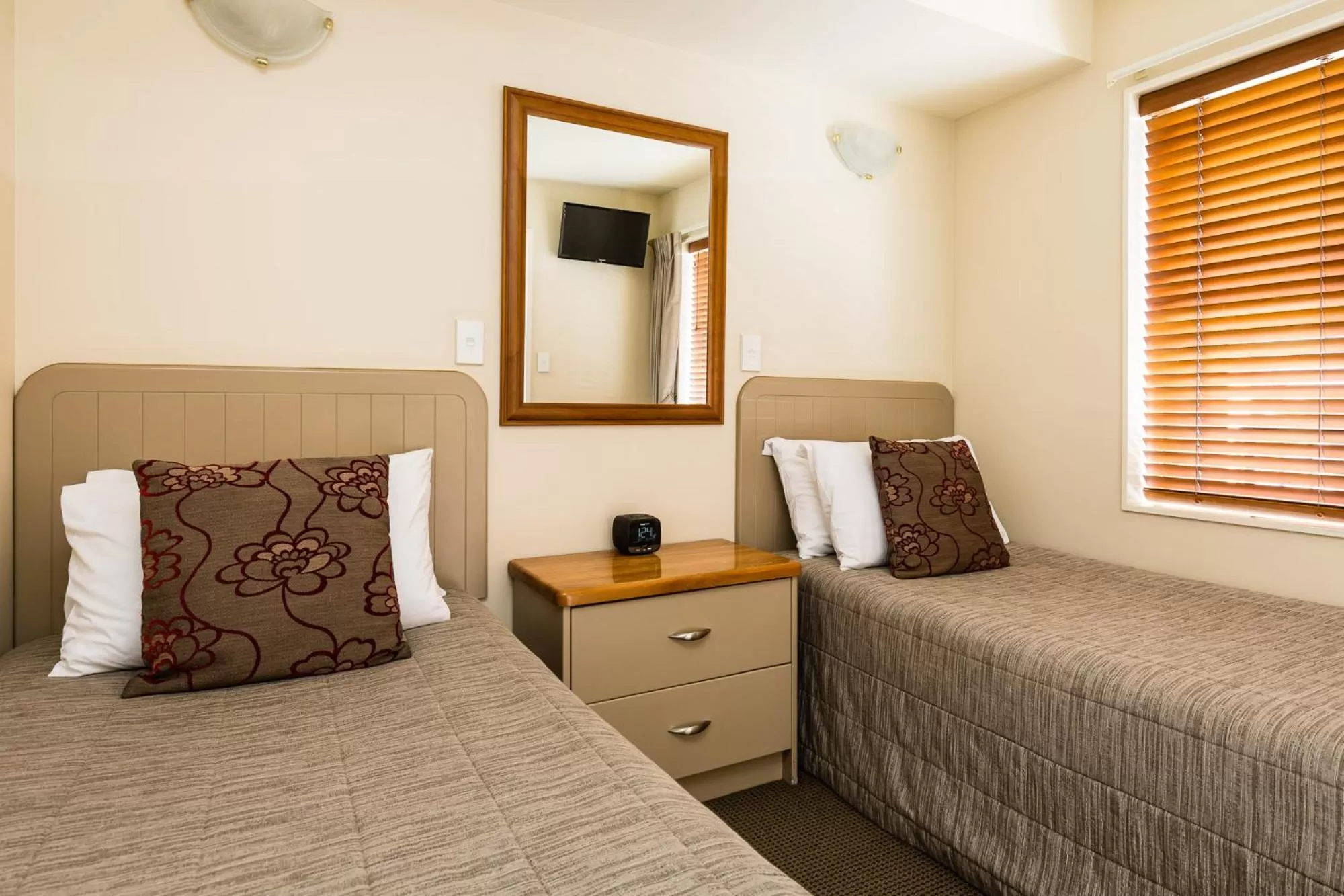 Bed in Pebble Beach Motor Inn