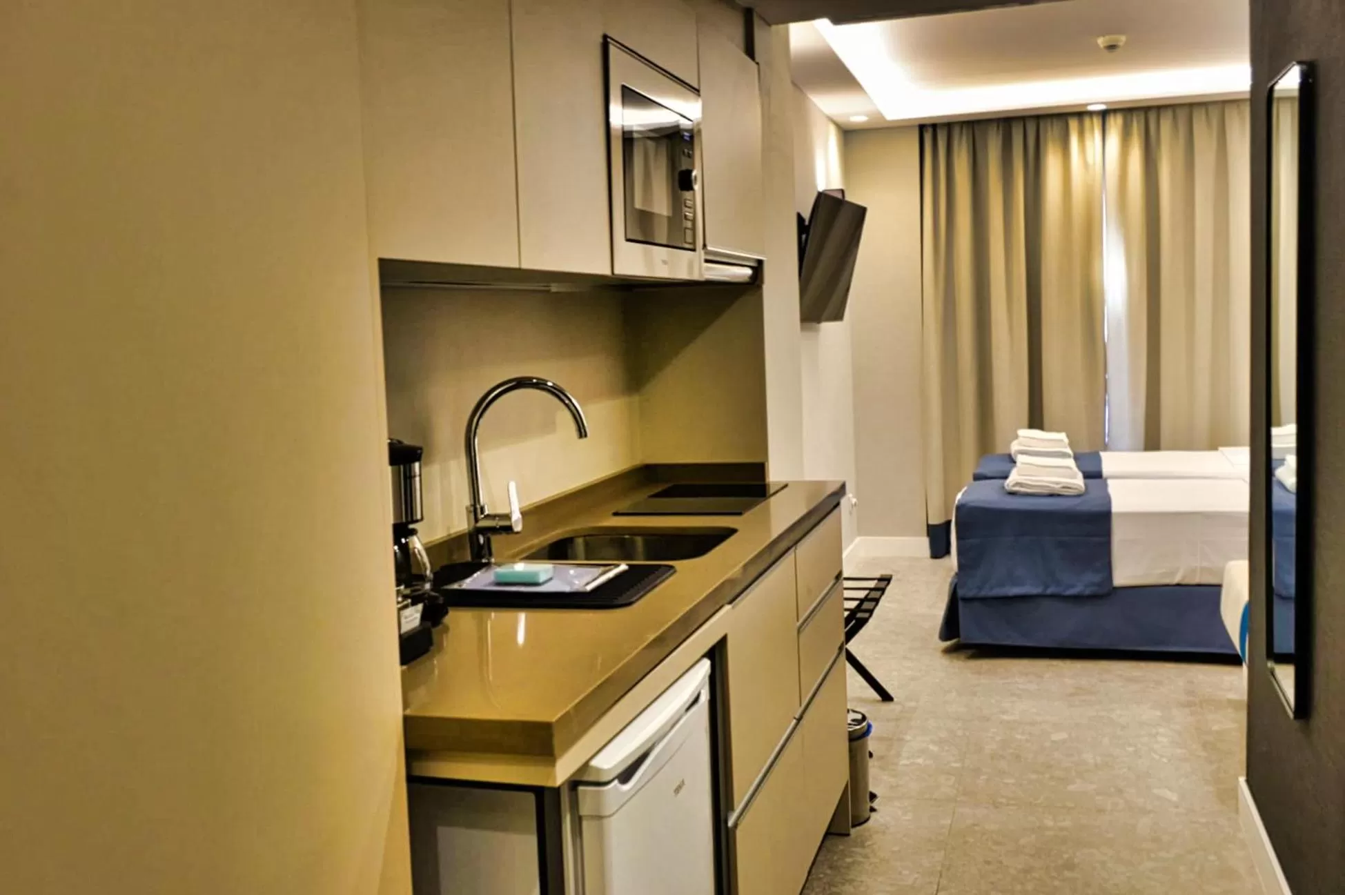 Kitchen or kitchenette, Bed in GBH Hotel-Apartamentos Posidonia