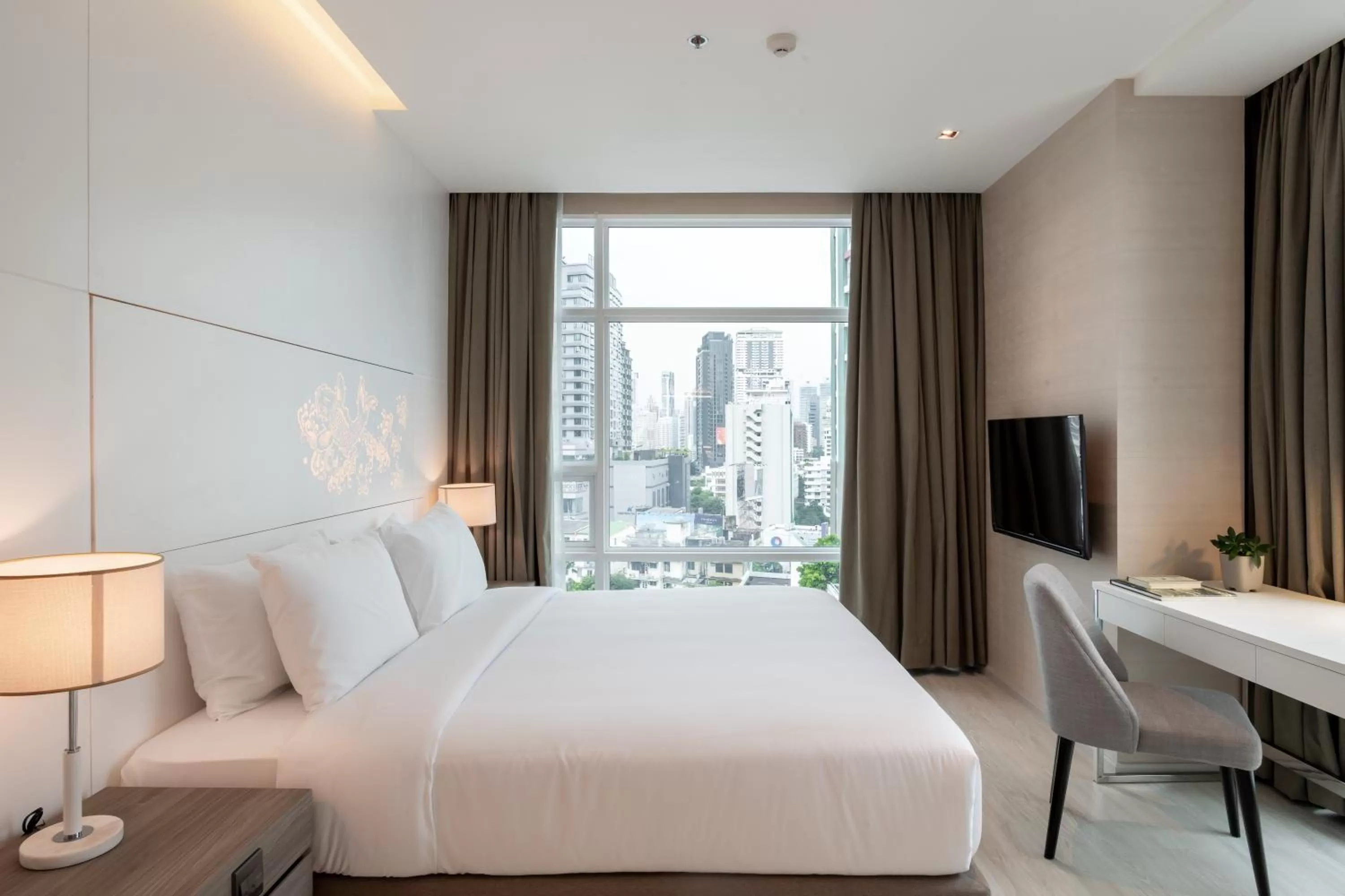 Bed in Jasmine 59 Hotel