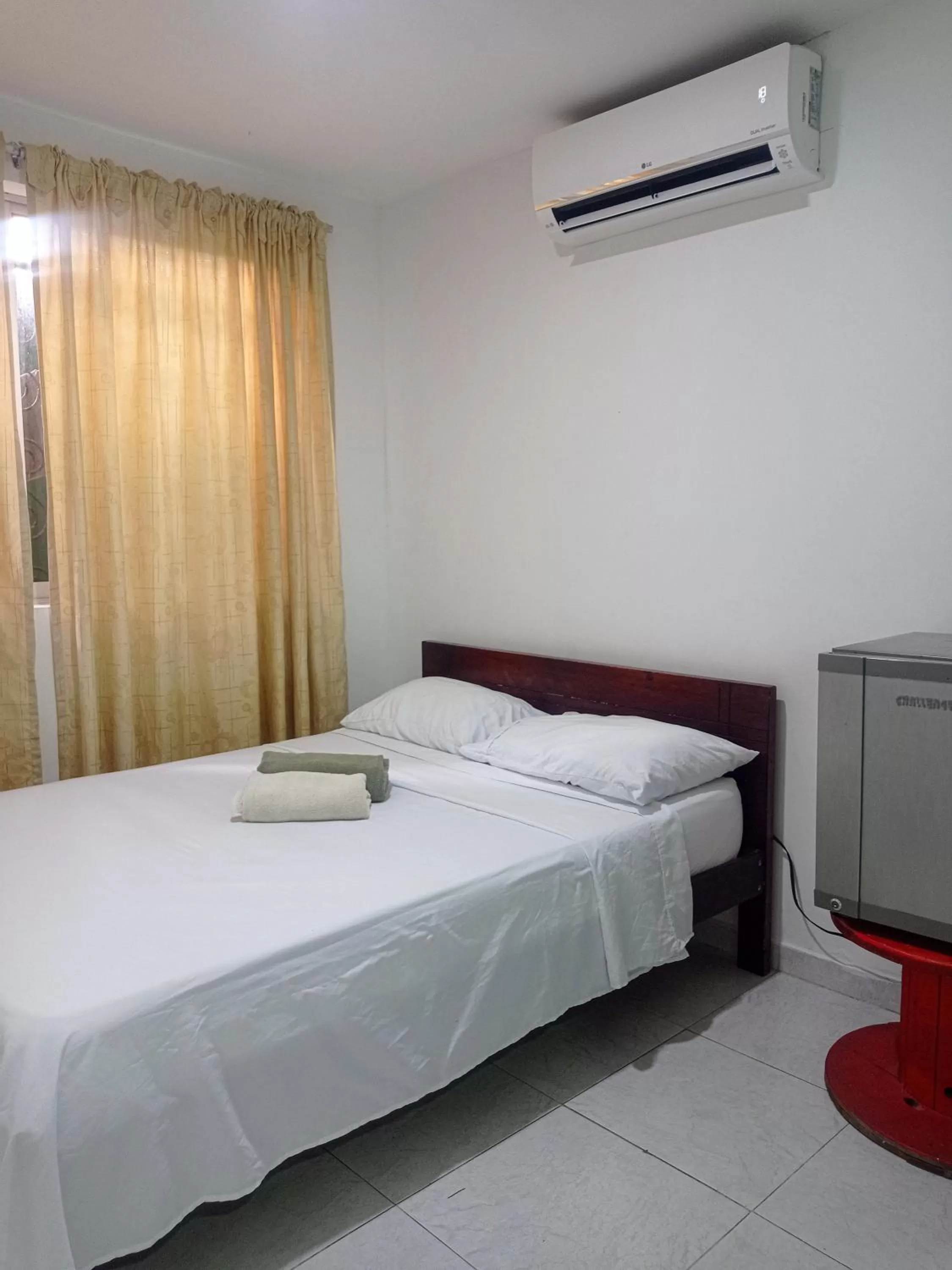 Bed in Posada Cultural Bahia Sonora