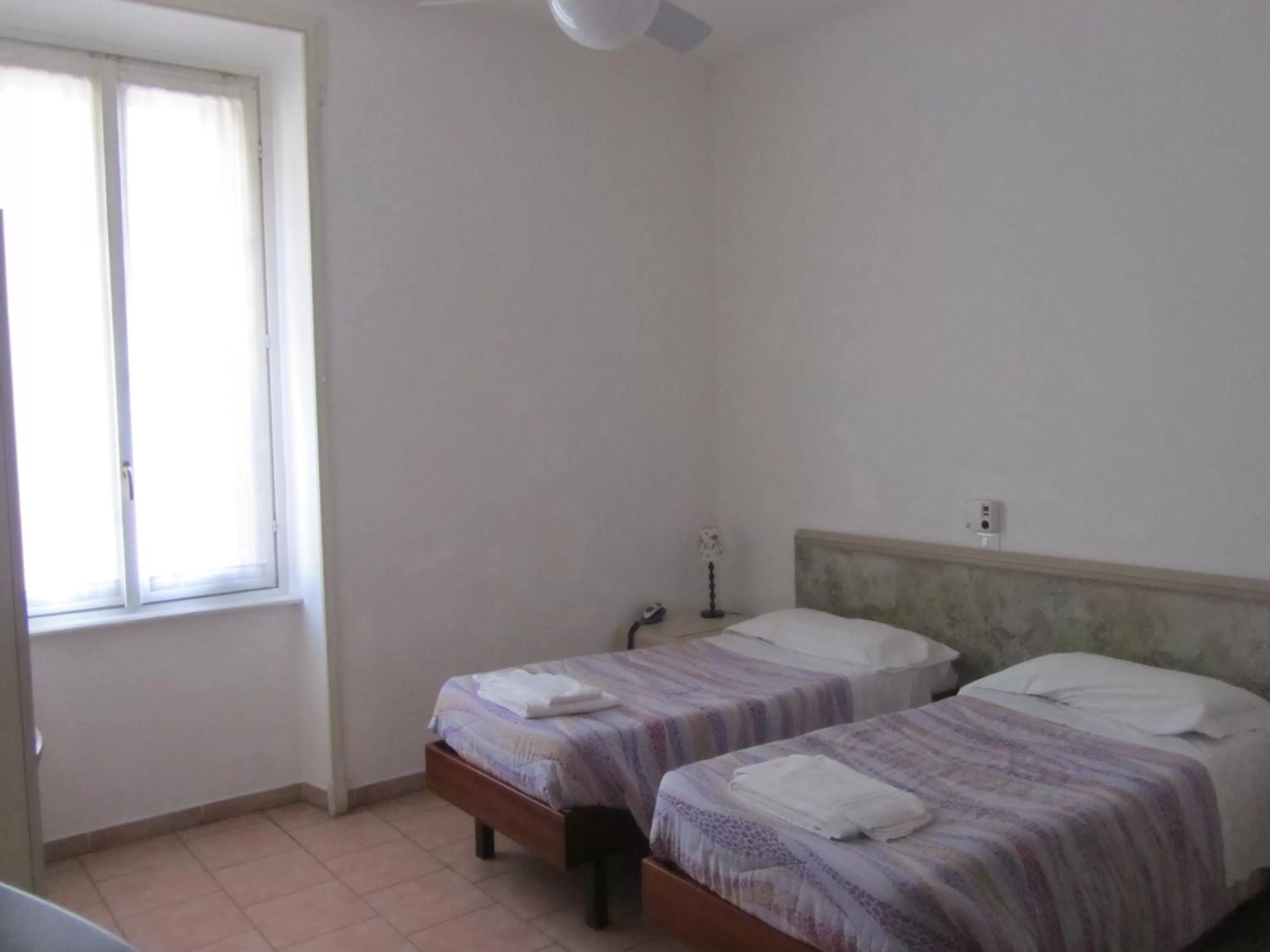 Bed in Hotel Gambara