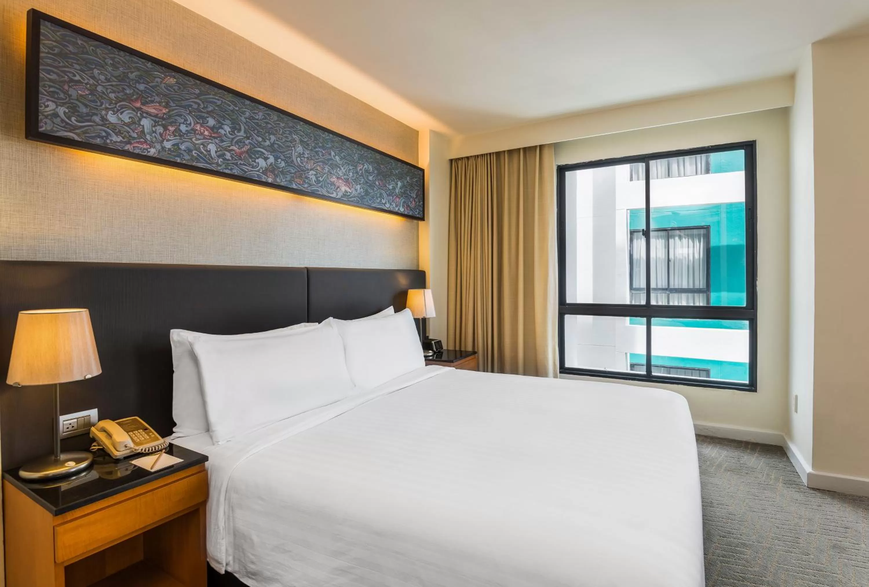 Bed in Chatrium Sathon Bangkok