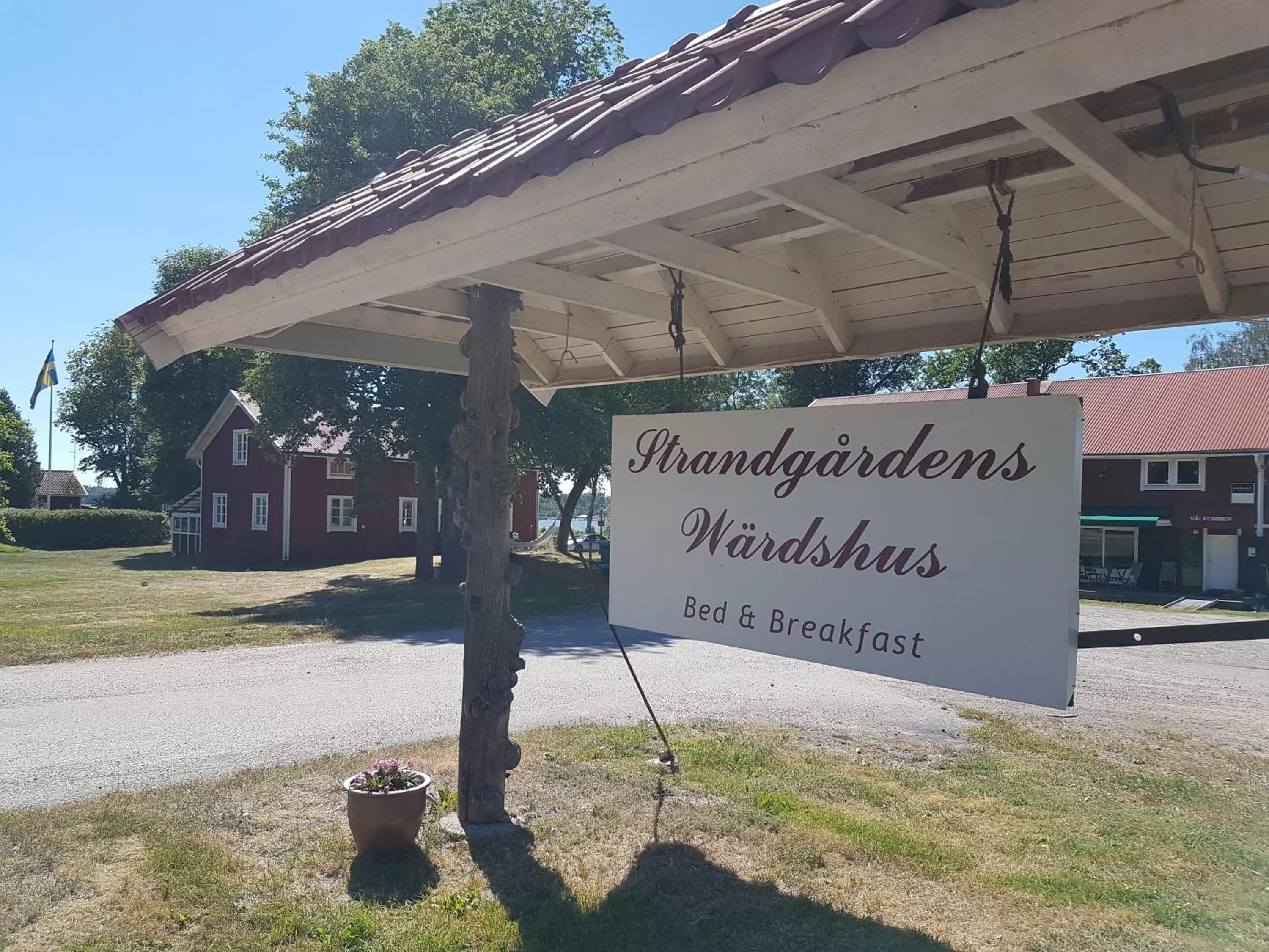 Property logo or sign in Nya Strandgårdens Wärdshus