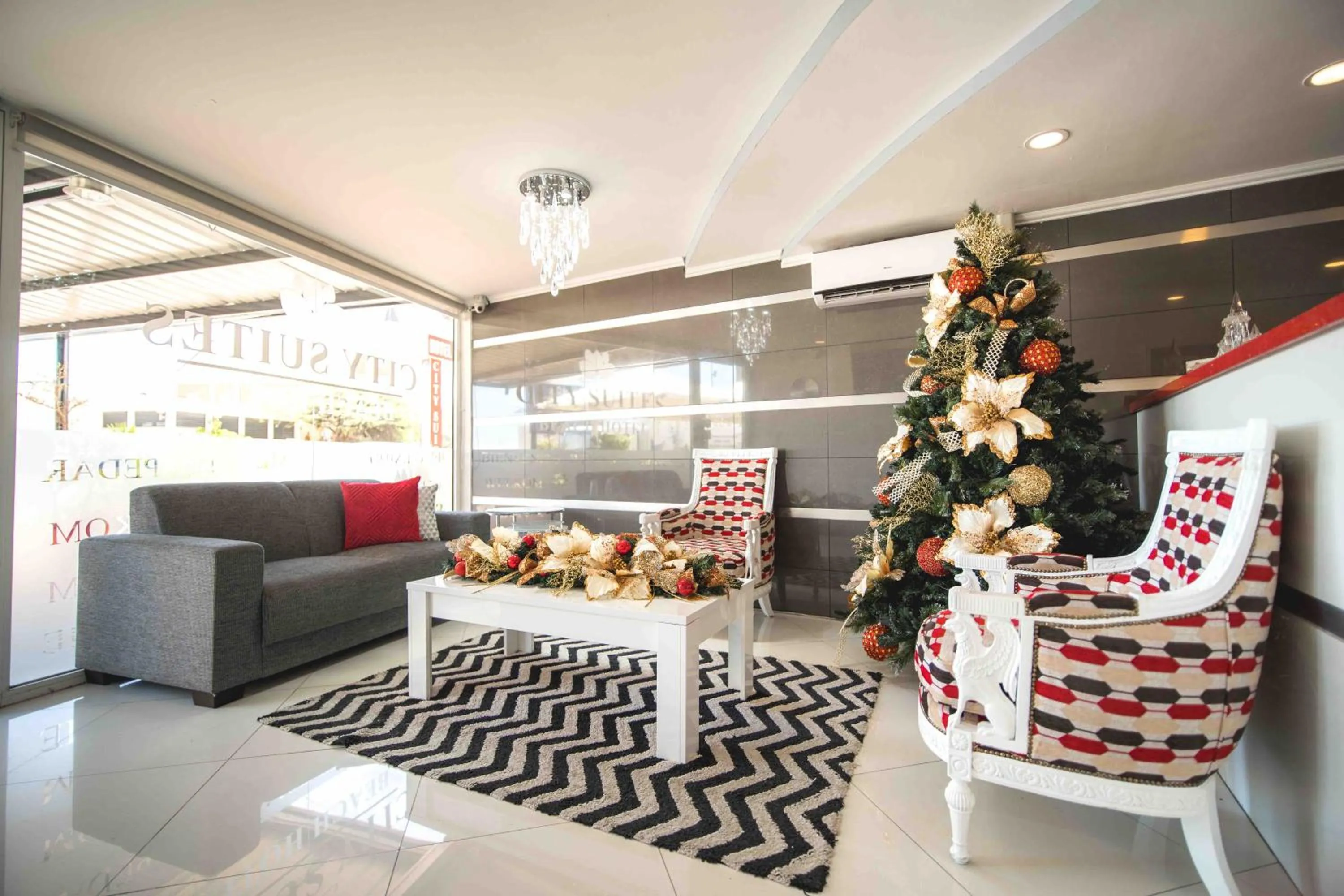Lobby or reception in Majestic City Suites & Beach Hotel
