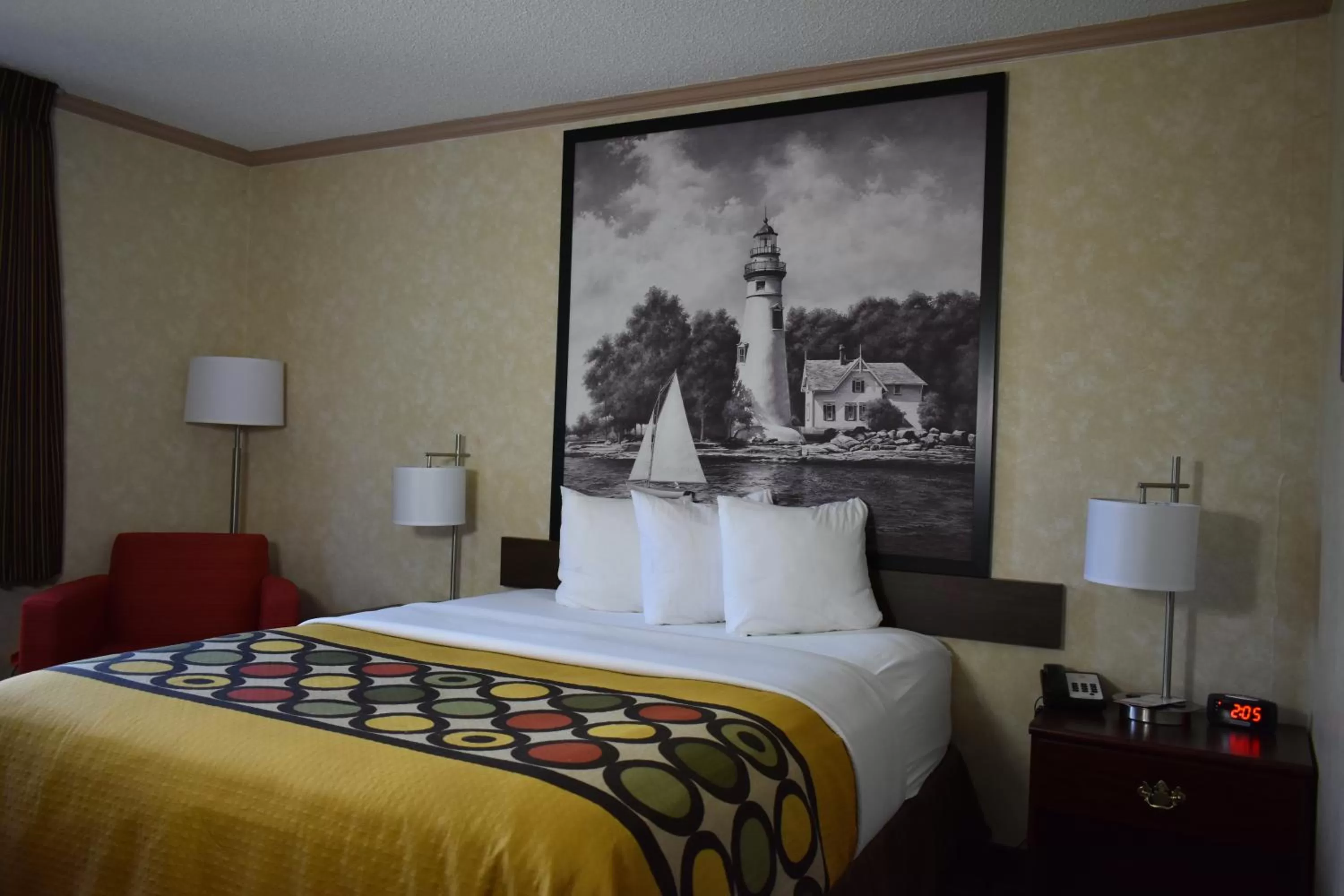 Bed in Super 8 by Wyndham Maumee Perrysburg Toledo Area