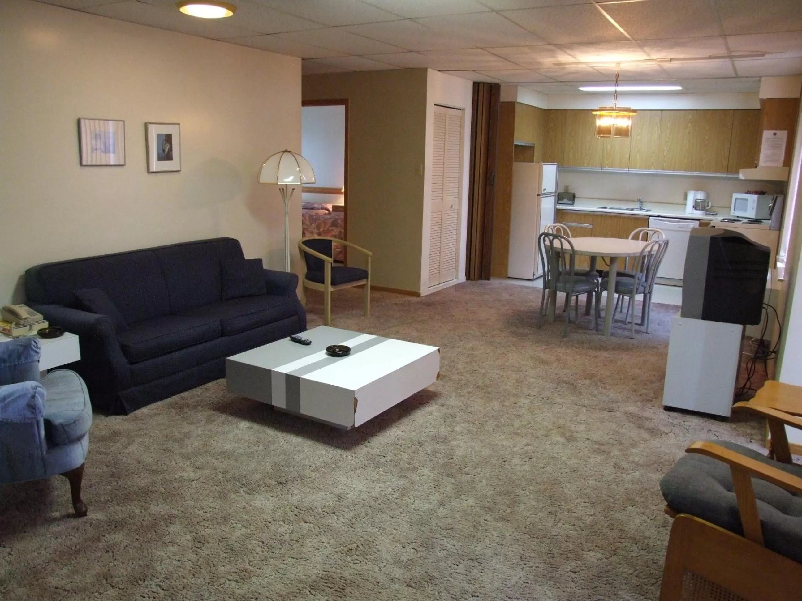 Kitchen or kitchenette in Hotellerie Jardins de Ville