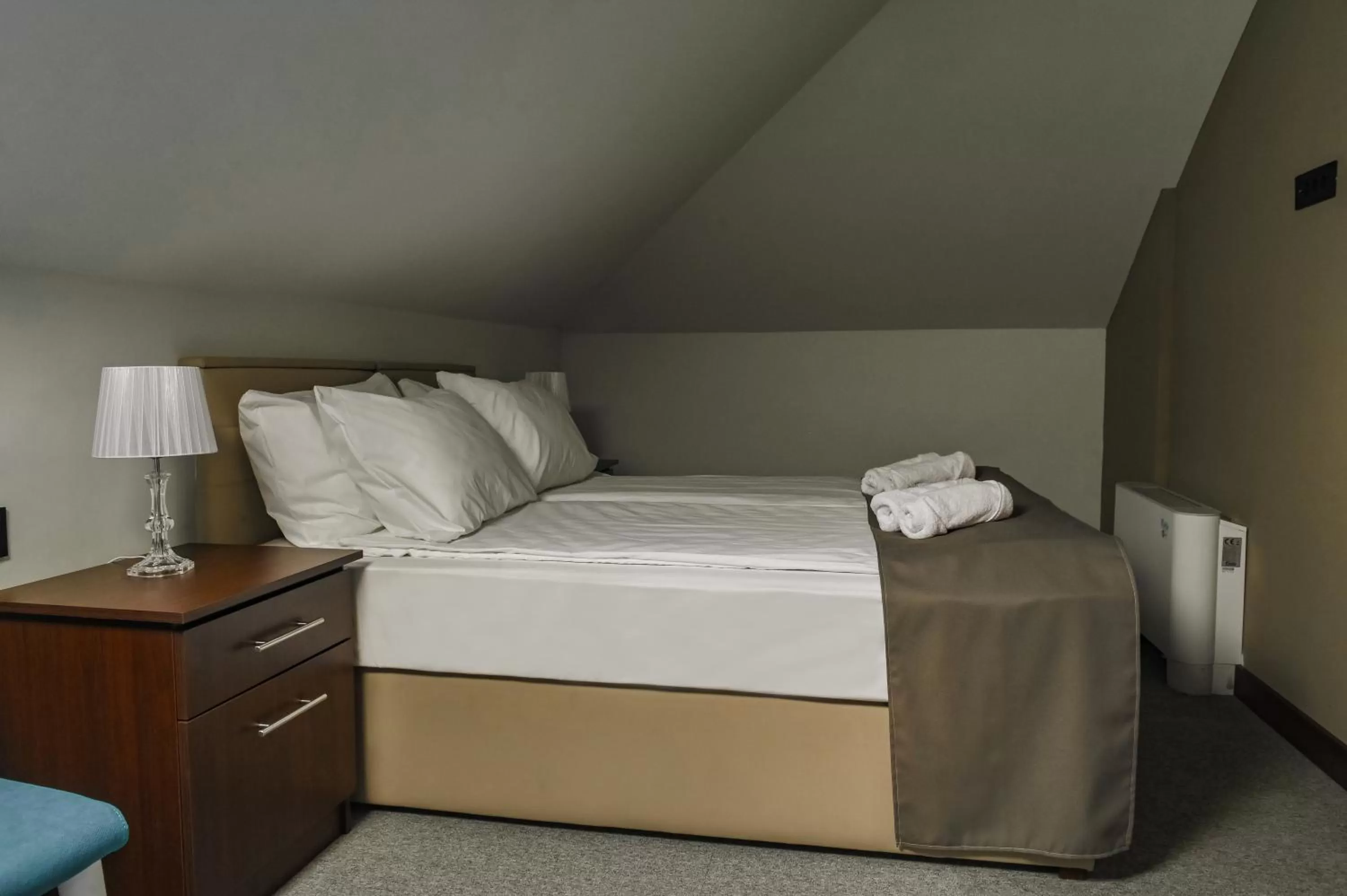 Bed in Garni Hotel Aline