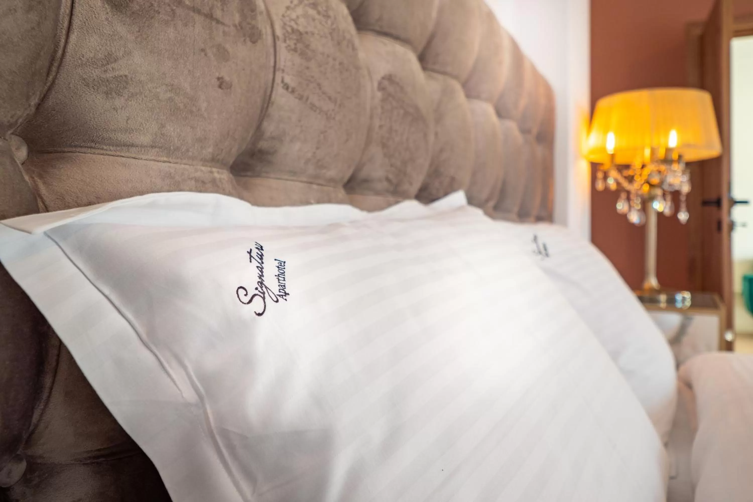 Bed in Signature Aparthotel - Boutique