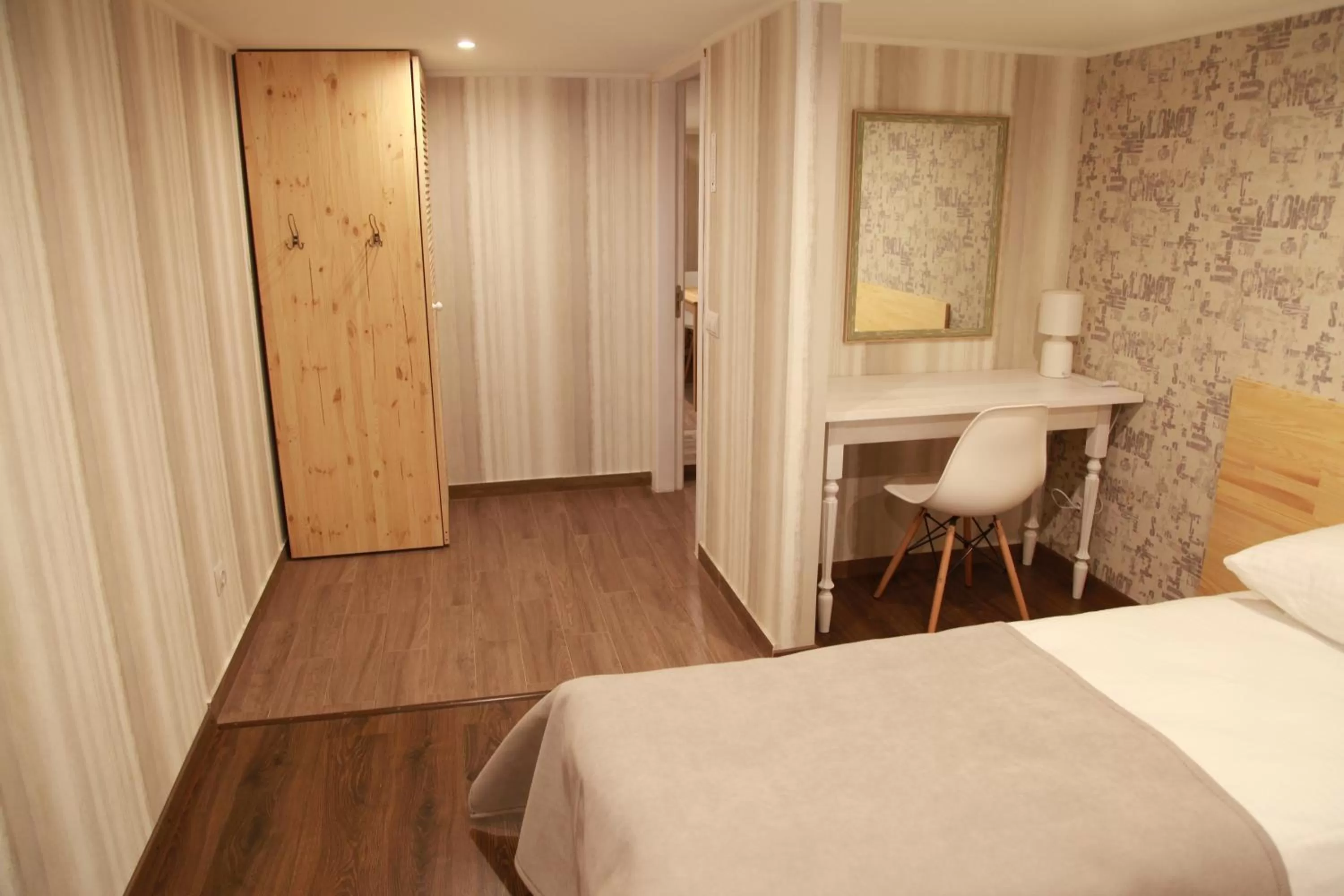 Bed in WINE & ROSE BOUTIQUE HOTEL