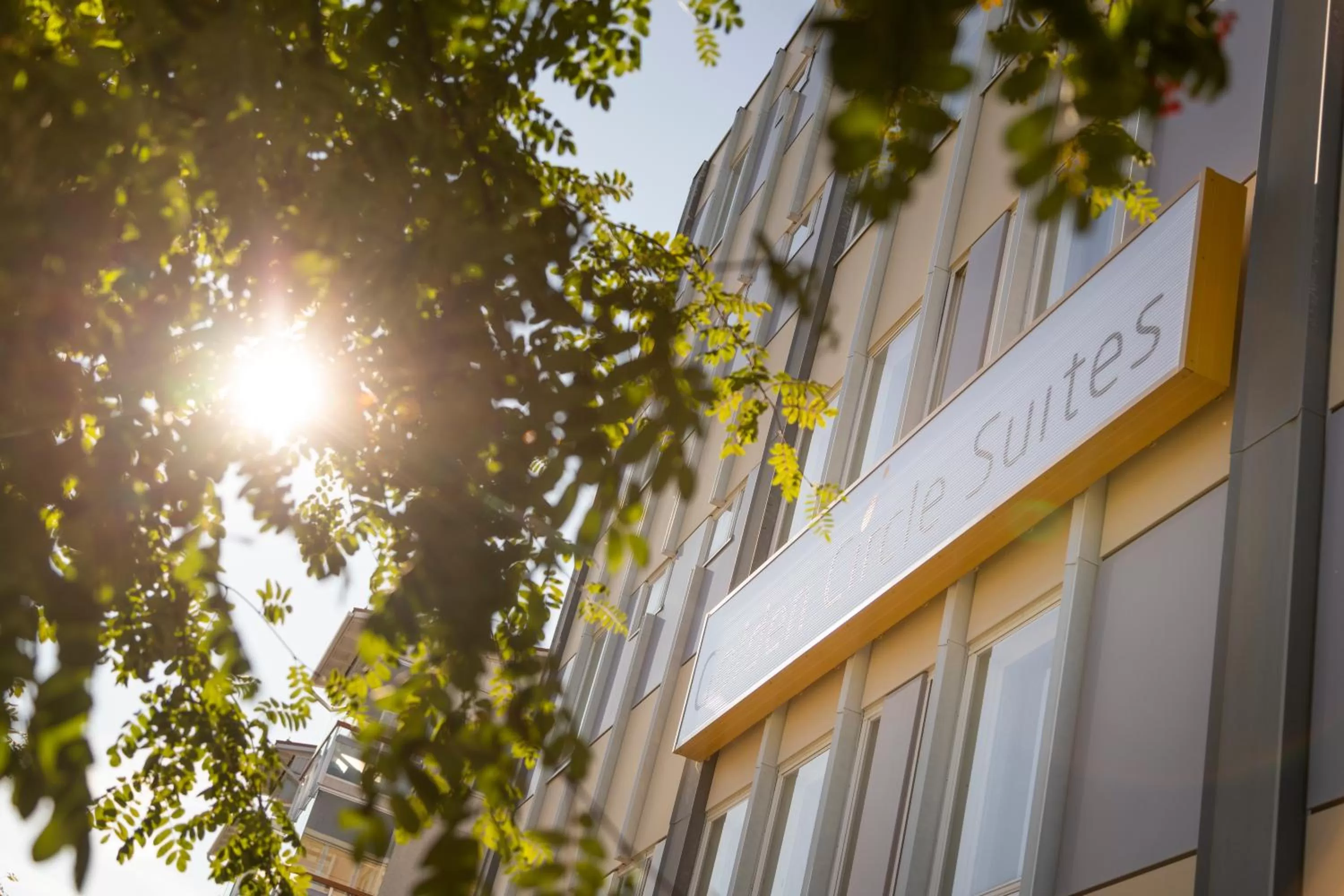 Property logo or sign in Hotel Golden Circle Suites