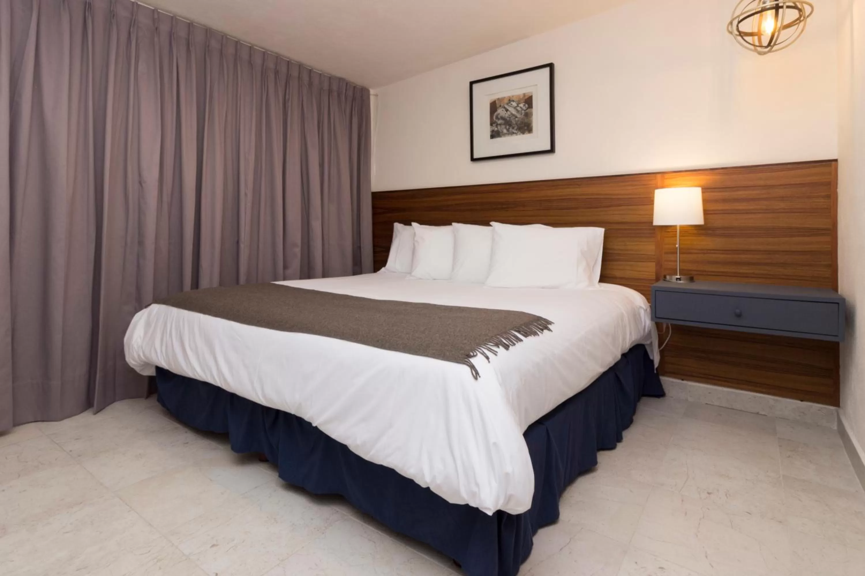 Bed in Arawi Hotel Boutique