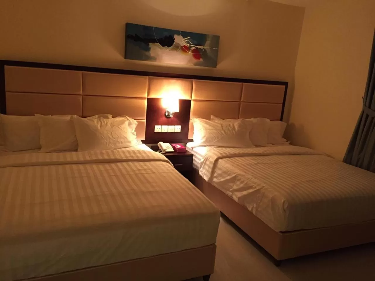 Bed in Arjaan Altakhassusi Hotel Suites