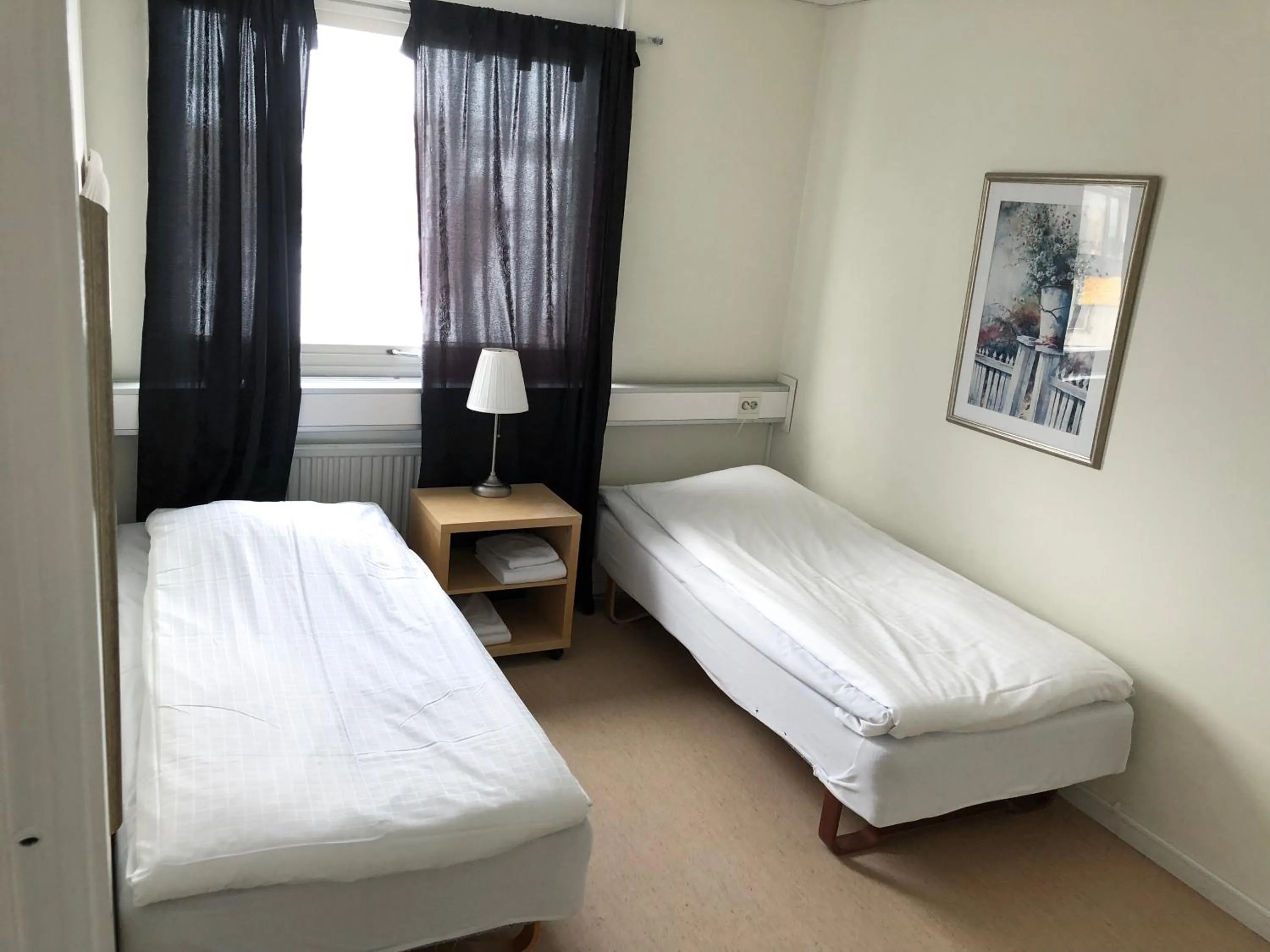 Photo of the whole room, Bed in Grand Hotell Bollnäs