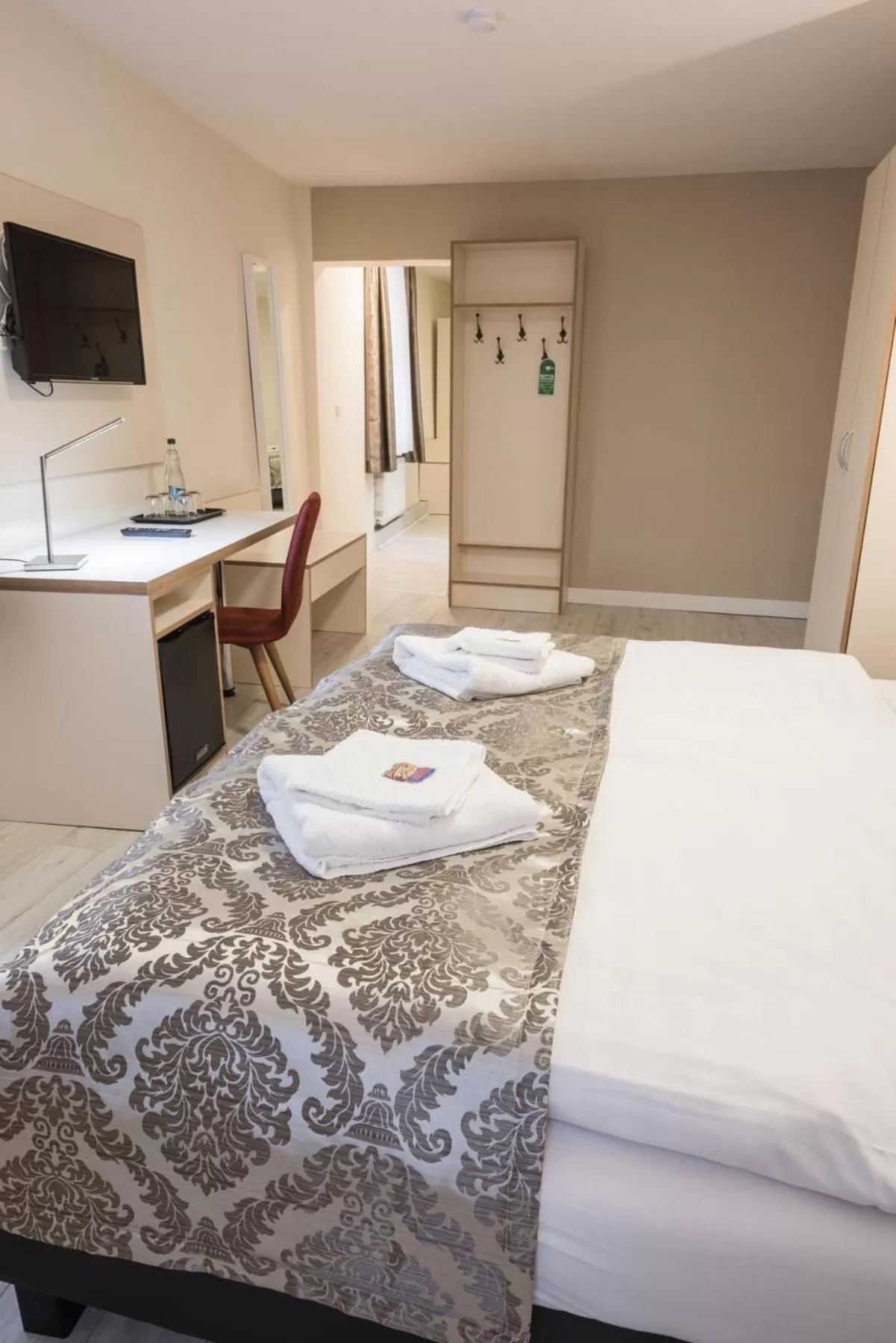 Photo of the whole room, Bed in Novel Hotel